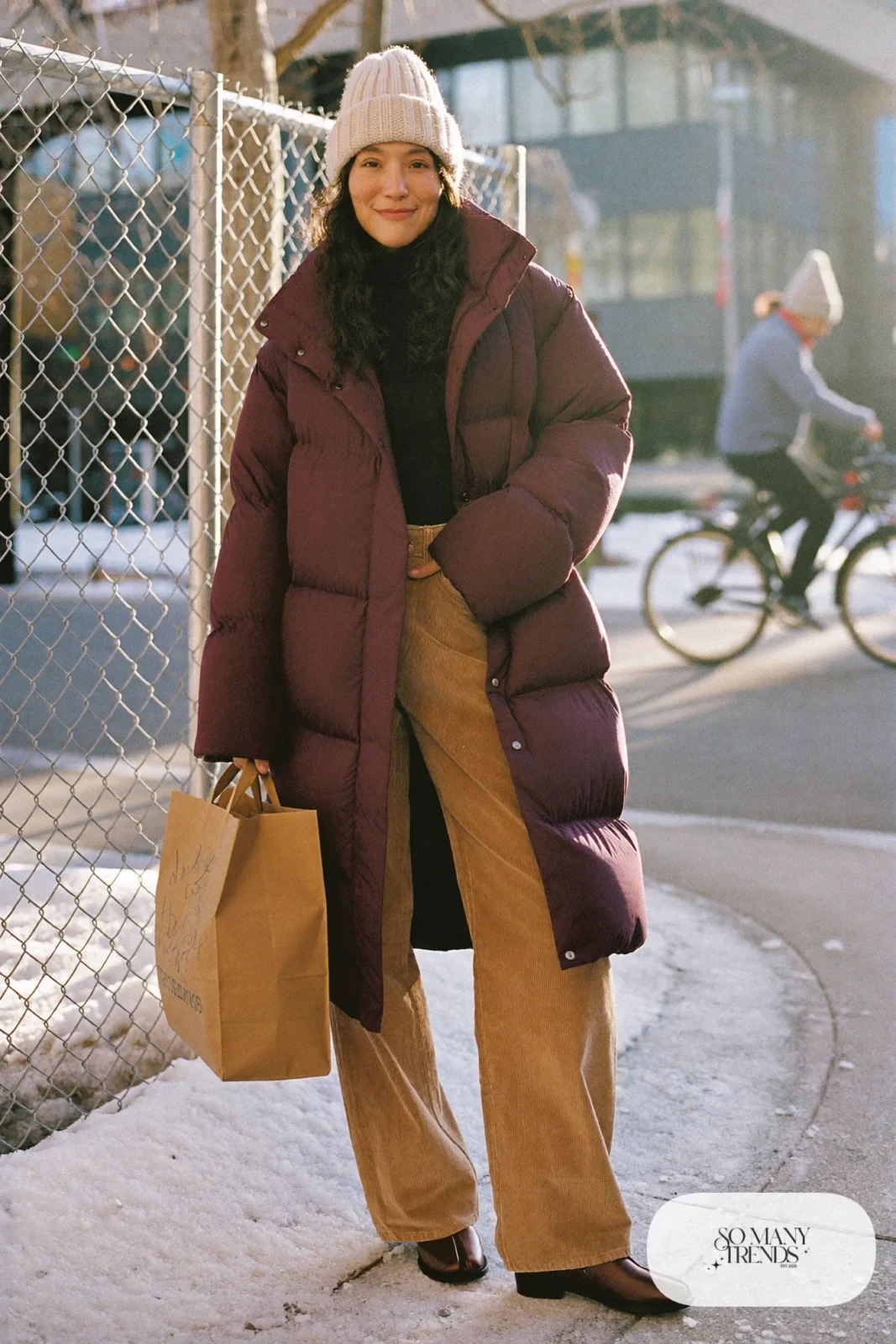 plum puffer coat camel wide corduroys merino turtleneck beanie ankle boots outfit 2