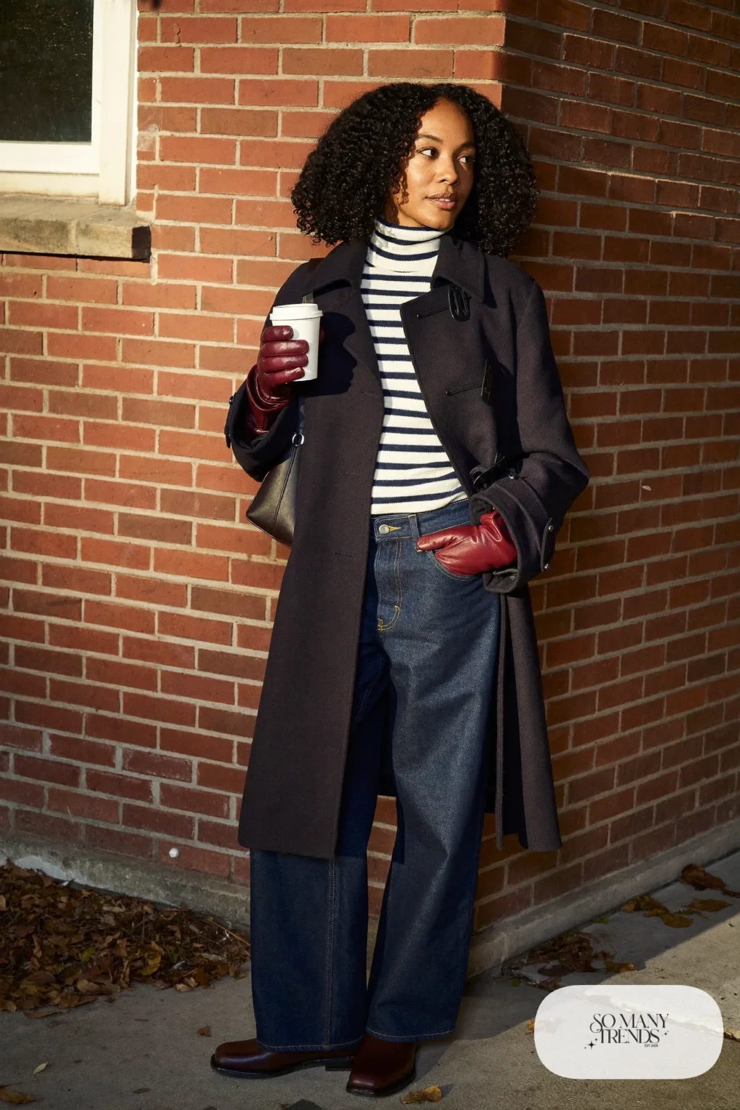 navy duffle coat striped turtleneck wide leg dark jeans burgundy mittens flat leather boots outfit 5