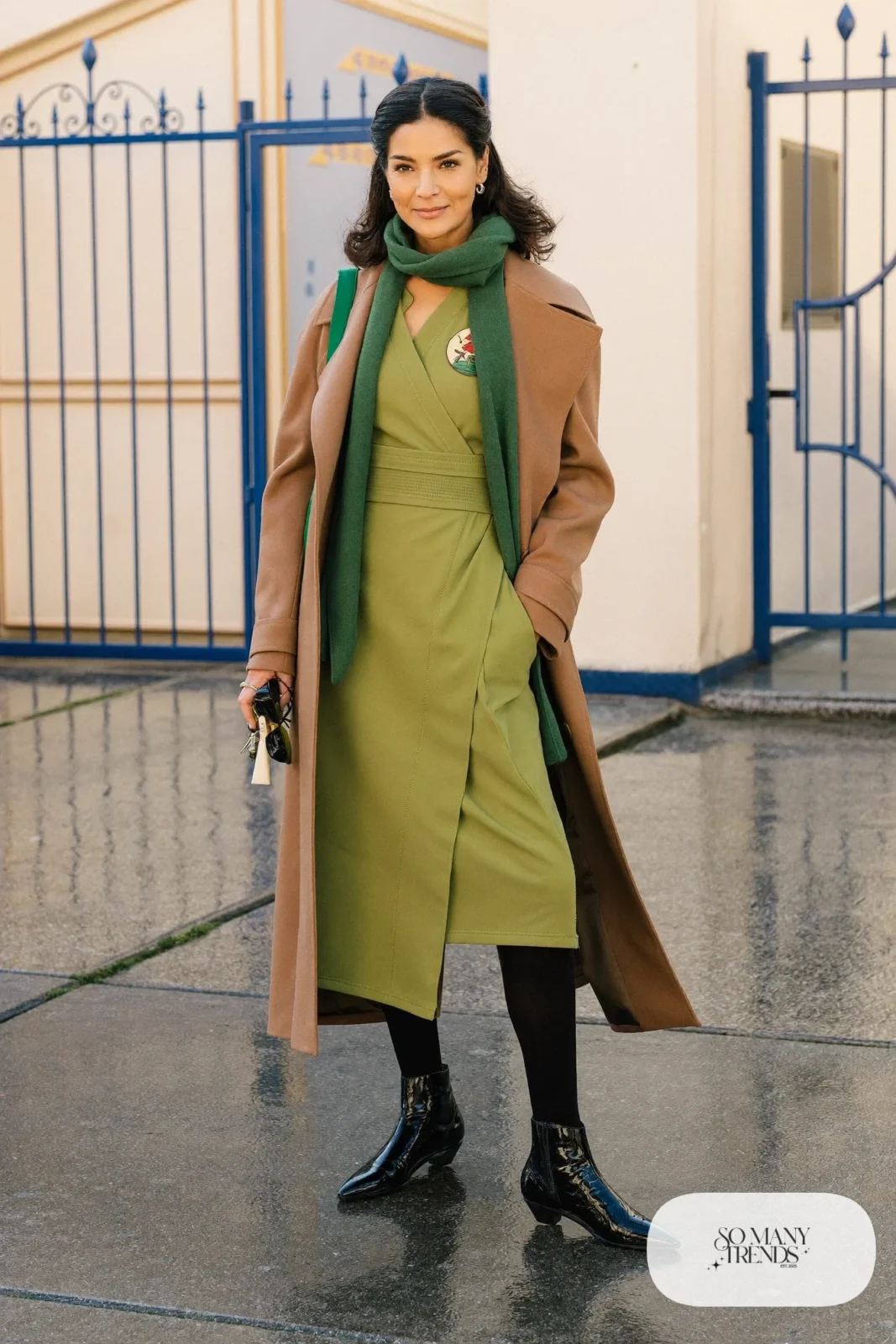 pine green jersey wrap dress long camel coat thick black tights low heel leather boots scarf outfit 22