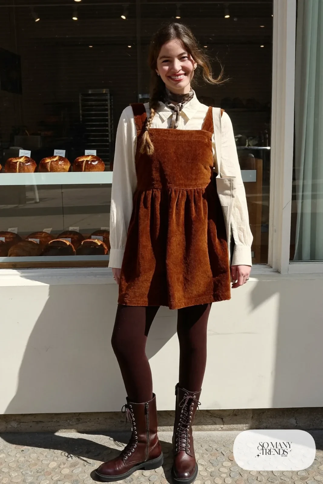 rust corduroy pinafore cream blouse brown thick tights lace up leather boots outfit 24