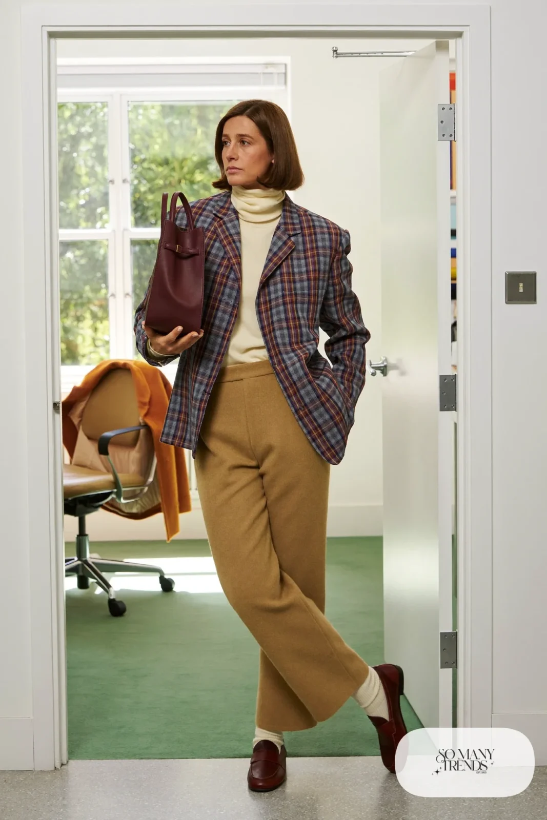 camel wool trousers cream turtleneck plaid blazer brown leather loafers thick socks outfit 27