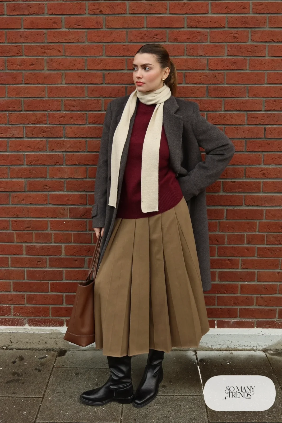 burgundy knit sweater camel pleated midi skirt black knee-high boots grey wool coat outfit 1
