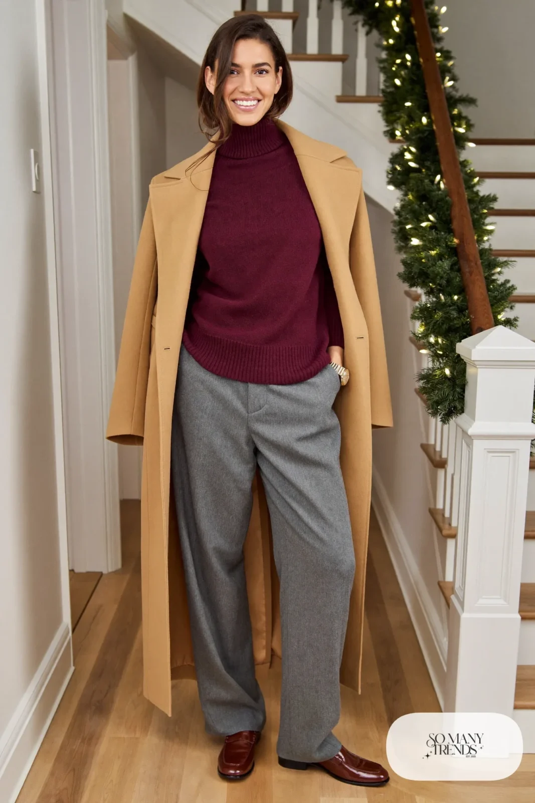 burgundy mock neck knit grey pleated wool trousers brown loafers long camel coat gold watch outfit 17