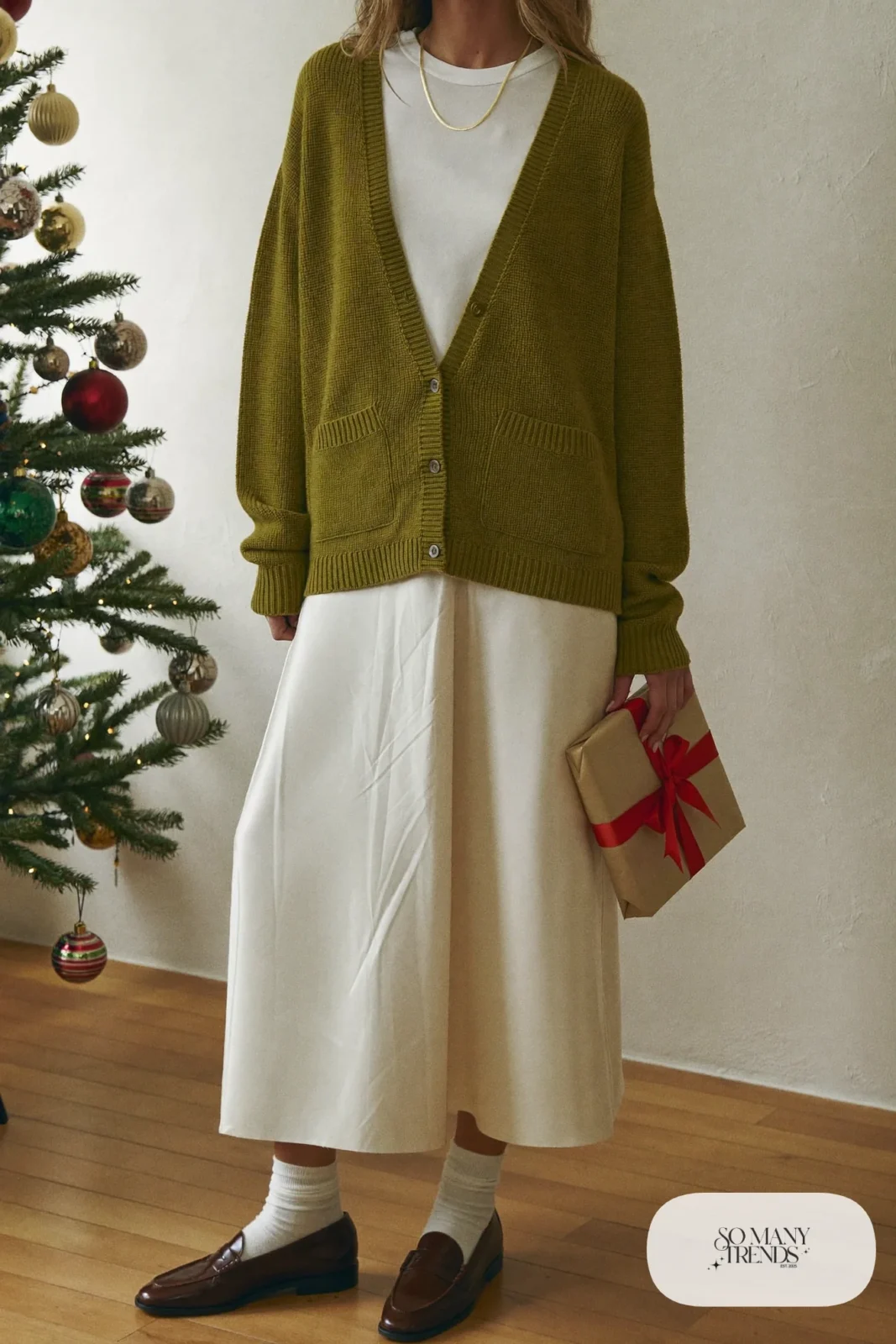 green knit cardigan white tee cream satin midi skirt brown loafers white socks gold necklace outfit 25