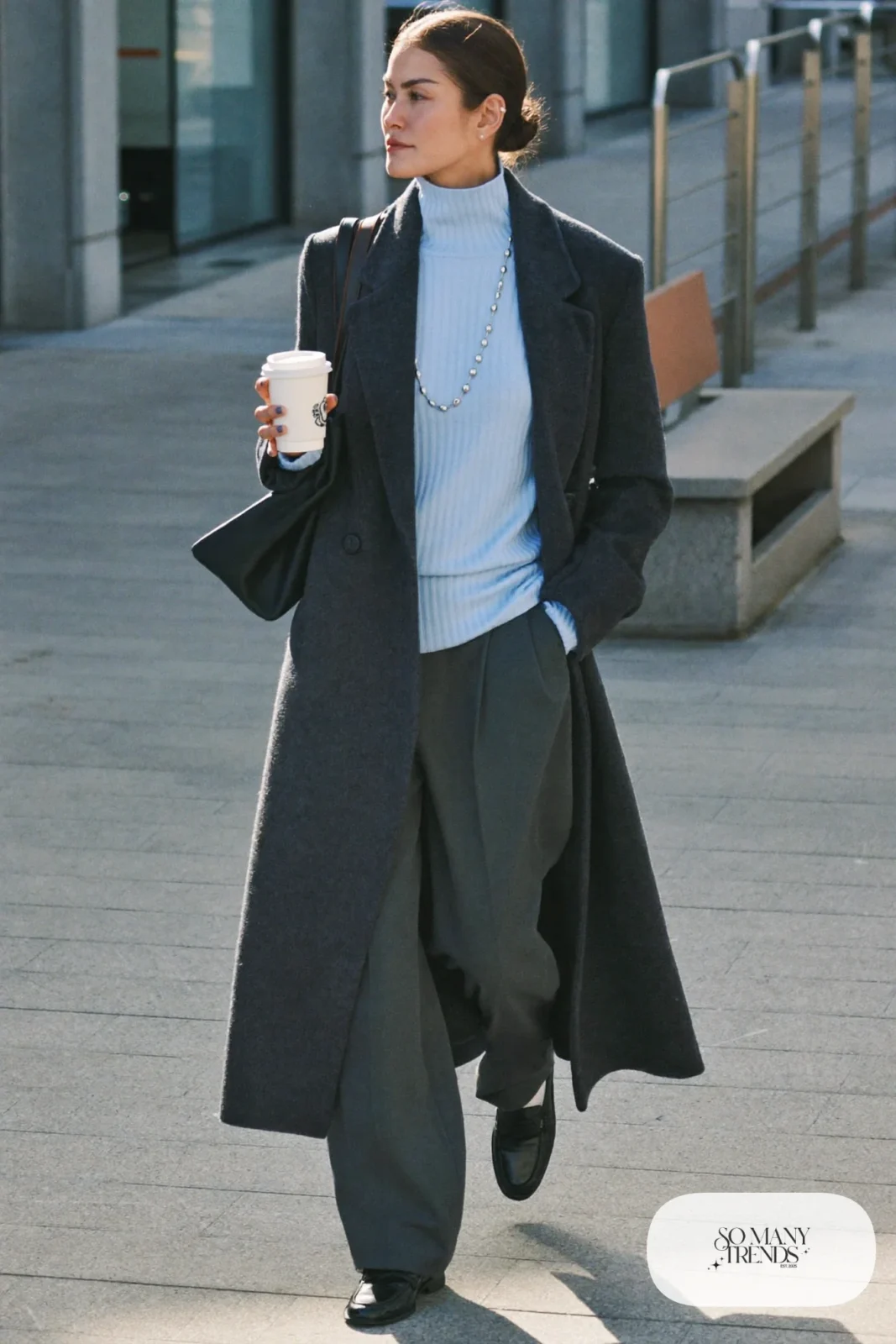 long charcoal gray wool coat gray turtleneck wide-leg pants black loafers silver chain outfit 14