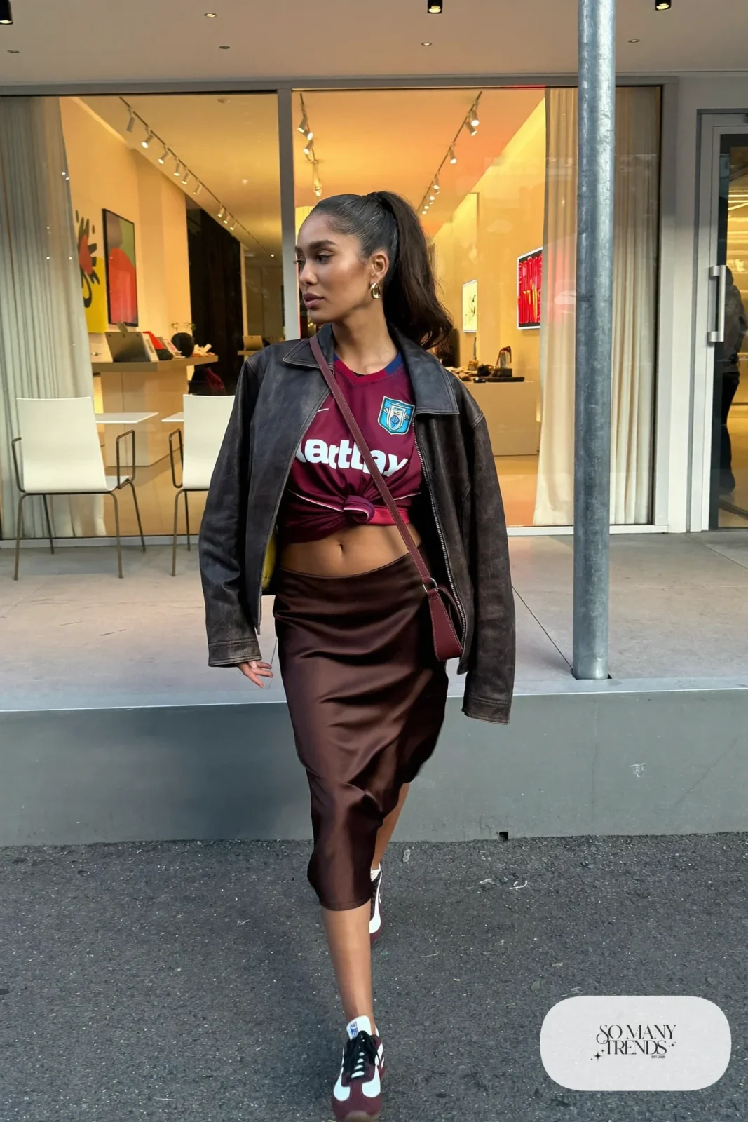 burgundy soccer jersey satin midi skirt retro sneakers leather jacket outfit 27
