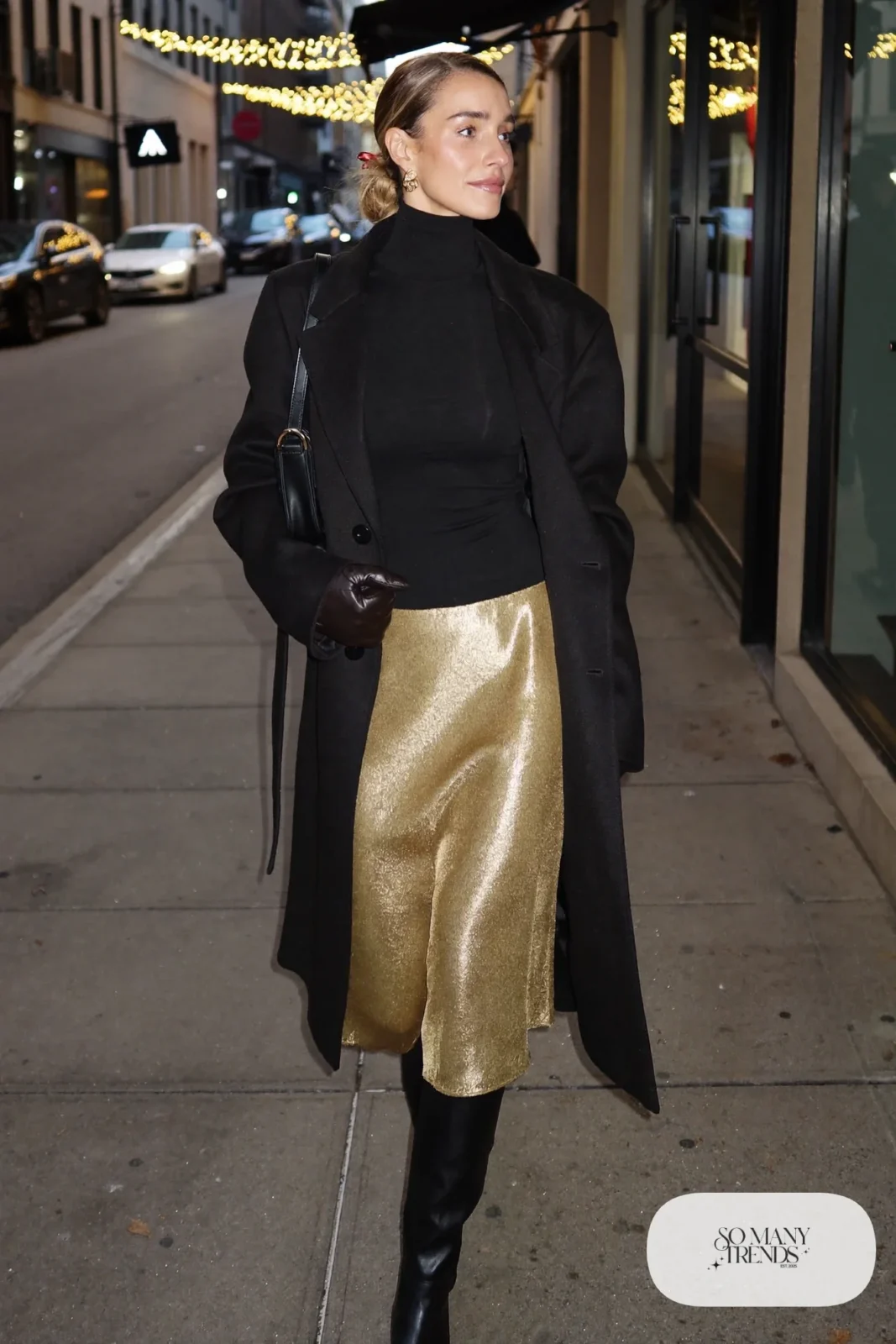 gold satin midi skirt black turtleneck long black coat tall boots leather gloves outfit 30