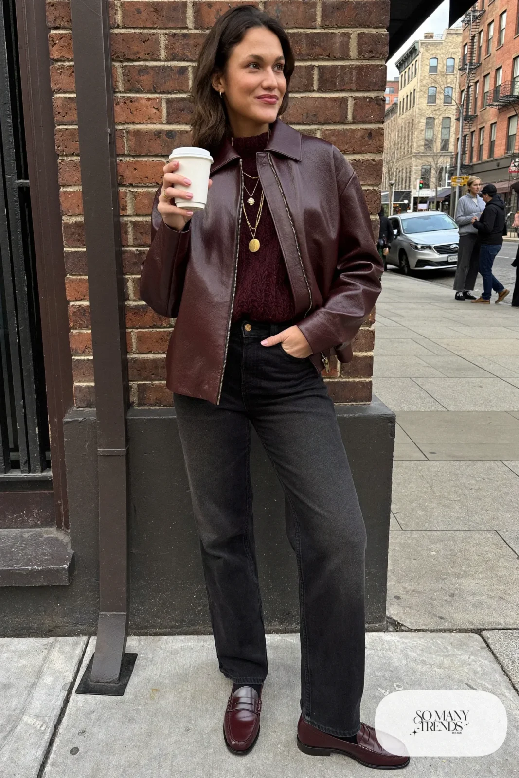 burgundy faux leather jacket burgundy sweater black jeans burgundy loafers outfit 5