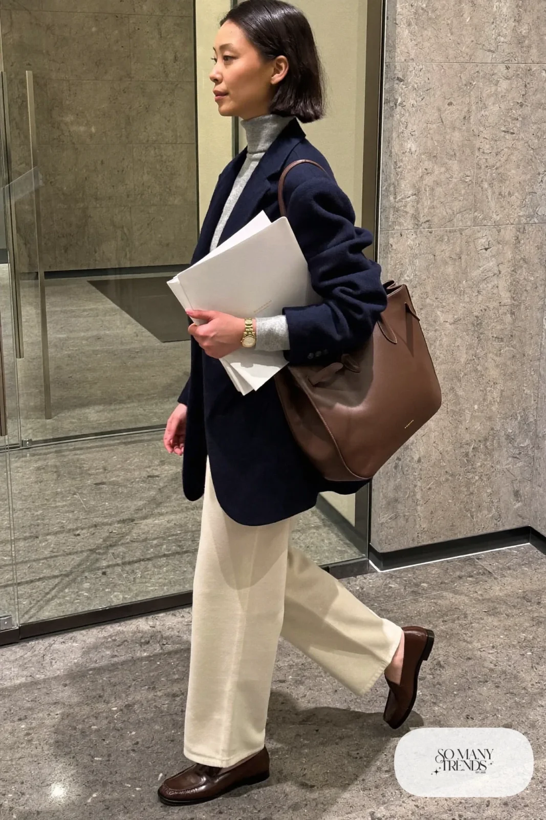 relaxed navy blazer, light gray merino turtleneck, cream wide-leg pants, brown loafers, gold watch, outfit 7