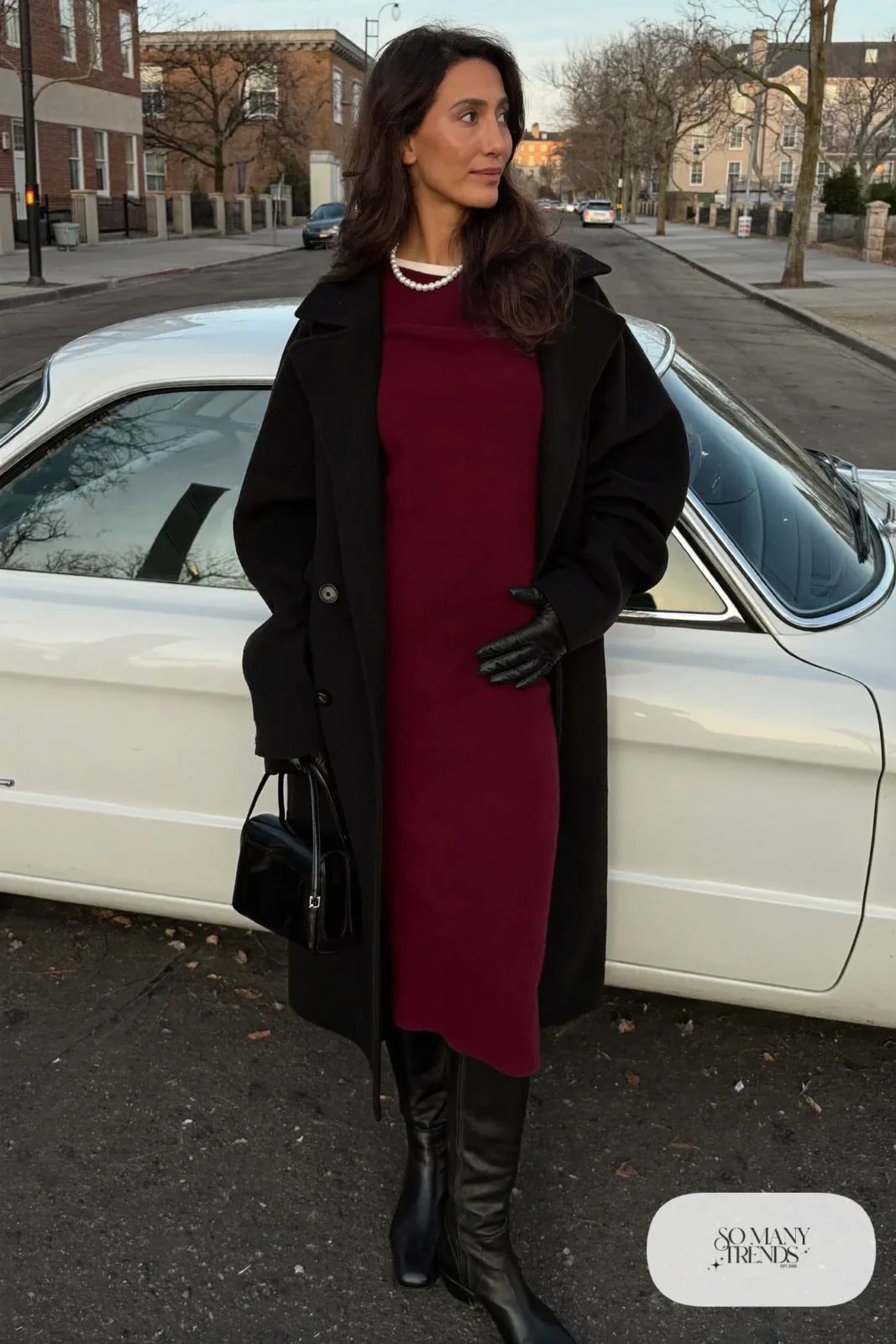 burgundy loose knit midi dress, long black wool coat, black knee-high boots, pearl necklace, outfit 11