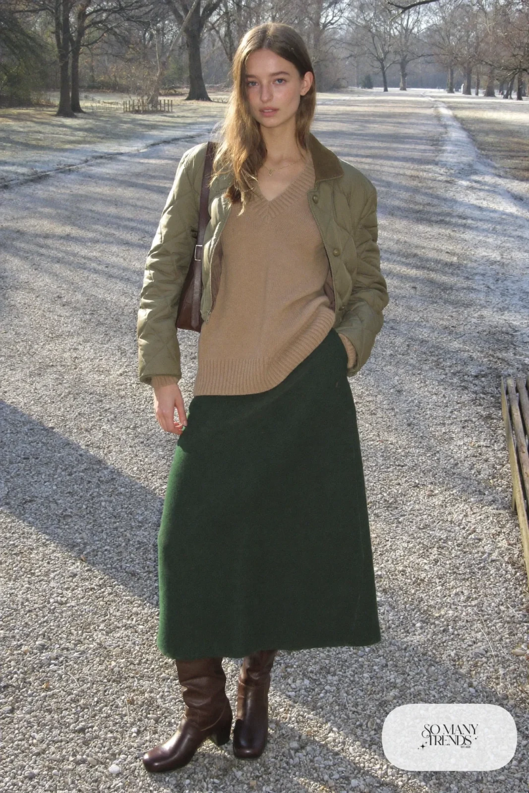 camel V-neck sweater, forest green wool midi skirt, tall brown boots, olive quilted jacket, outfit 14