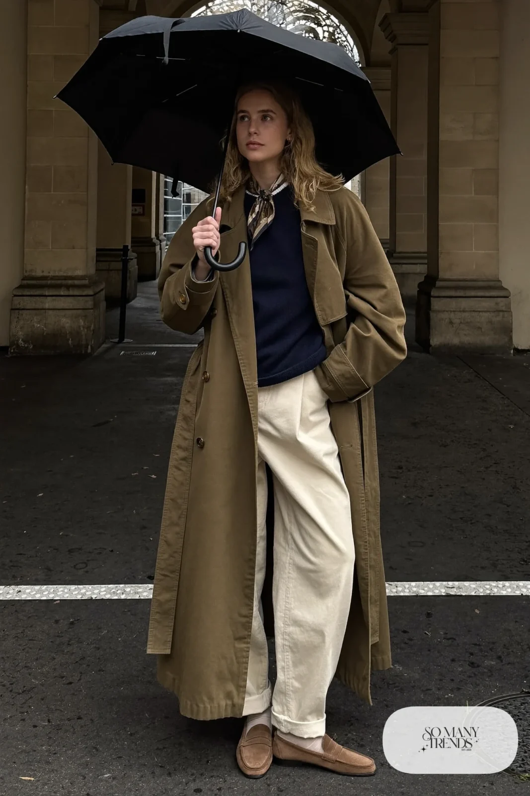 long olive trench coat, navy sweater, cream wide-leg pants, brown suede loafers, silk scarf, outfit 22