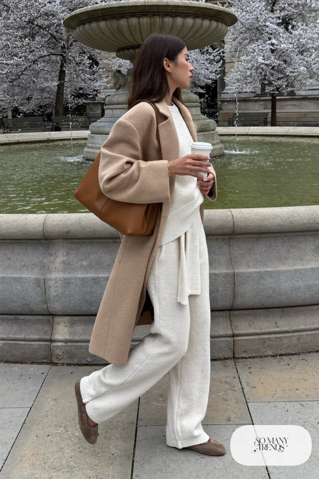cream knit sweater, matching wide-leg knit pants, long camel coat, taupe suede flats, tan leather bag, outfit 23