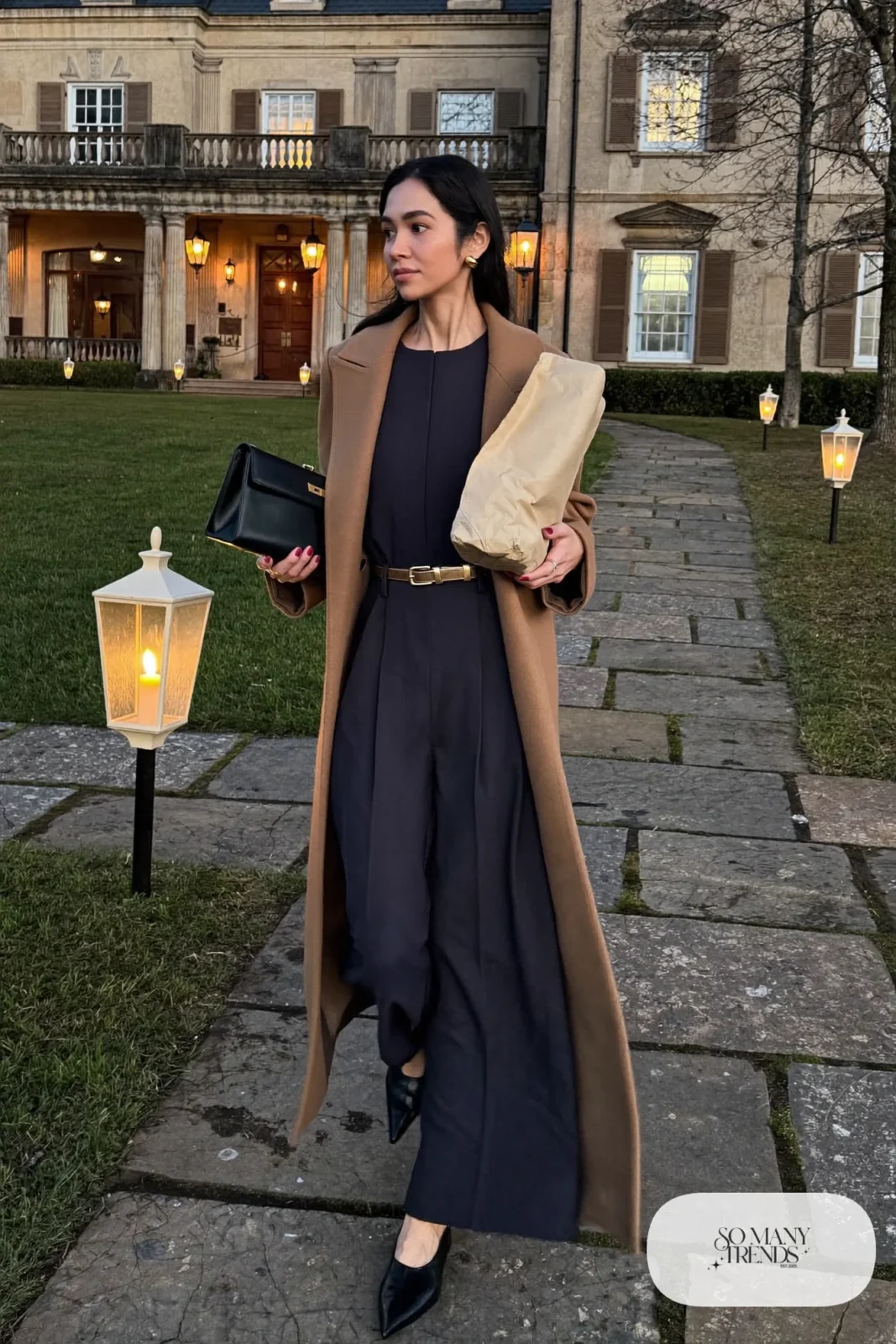 long-sleeved navy crepe wide-leg jumpsuit, long camel coat, black pointed flats, thin gold belt, outfit 29