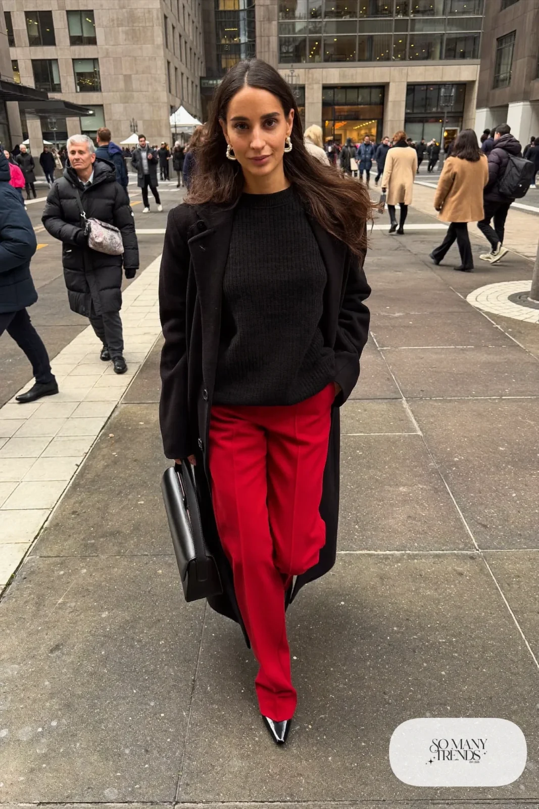 red tailored wide leg trousers black fine knit sweater black loafers long black coat work outfit 16