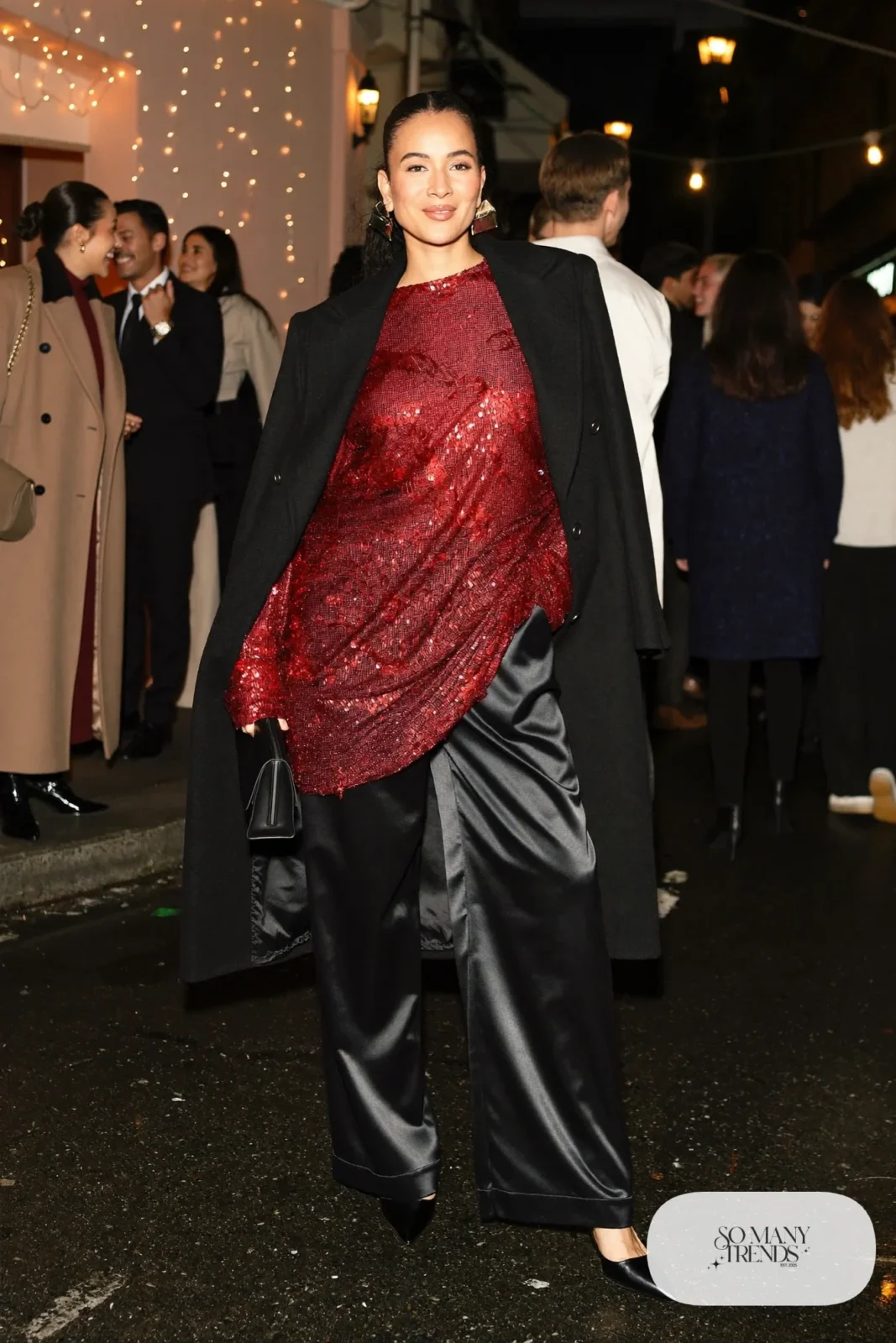 red sequin top black satin wide leg pants black pointed pumps black coat new years outfit 20