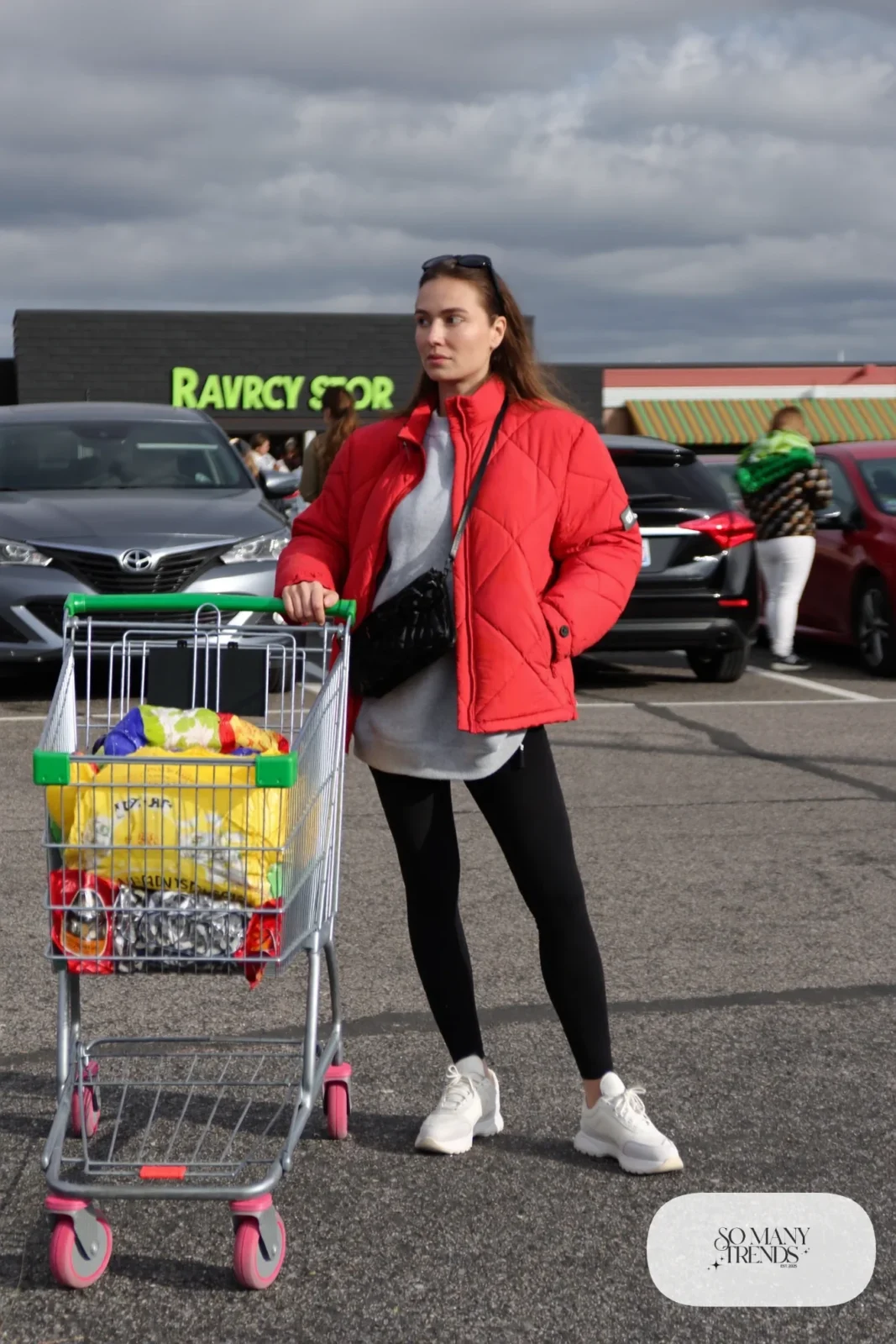 red quilted jacket gray sweatshirt black leggings chunky white sneakers crossbody bag weekend outfit 28