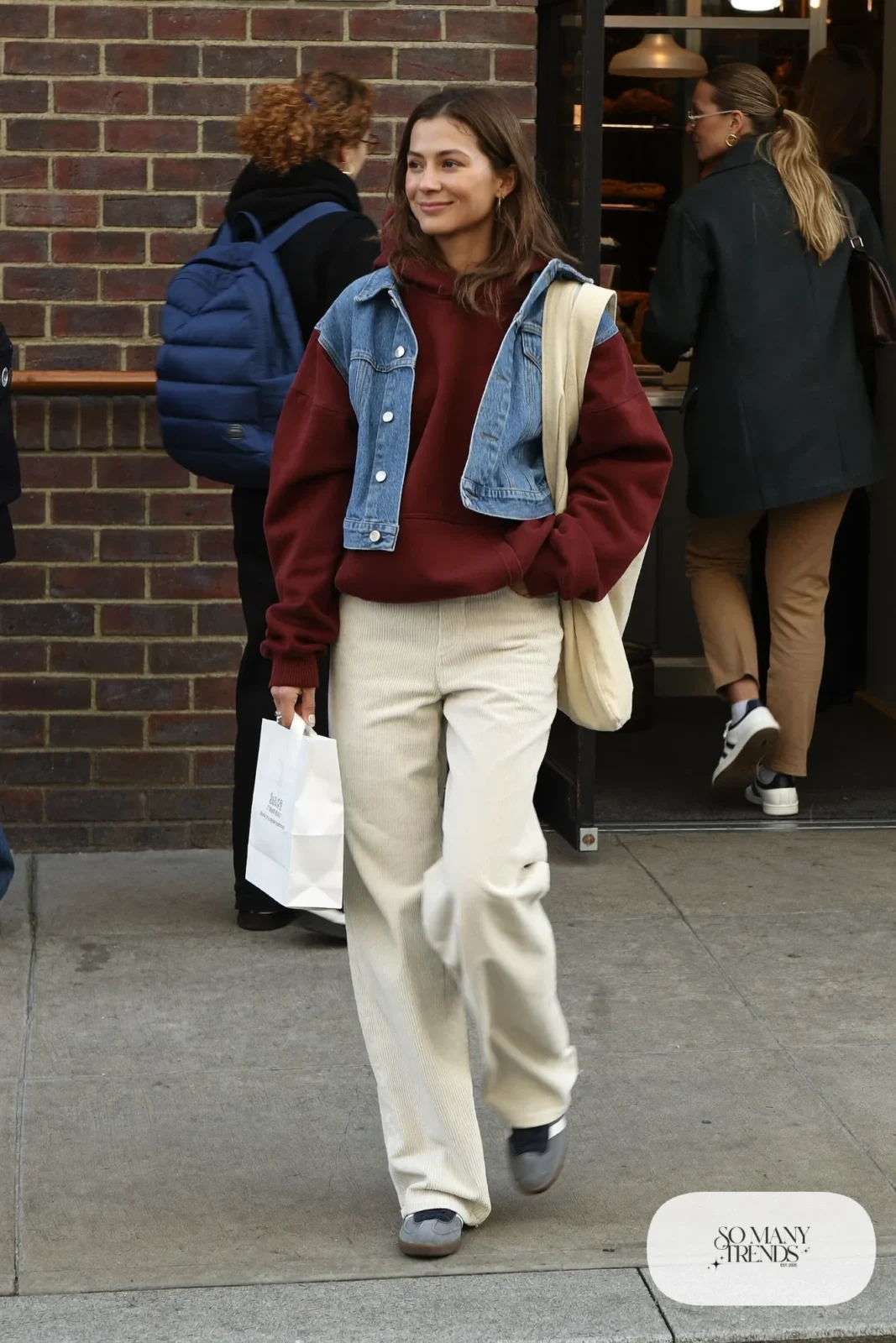 wine heavyweight hoodie cream wide-leg corduroy pants denim jacket gray sneakers canvas tote outfit 8