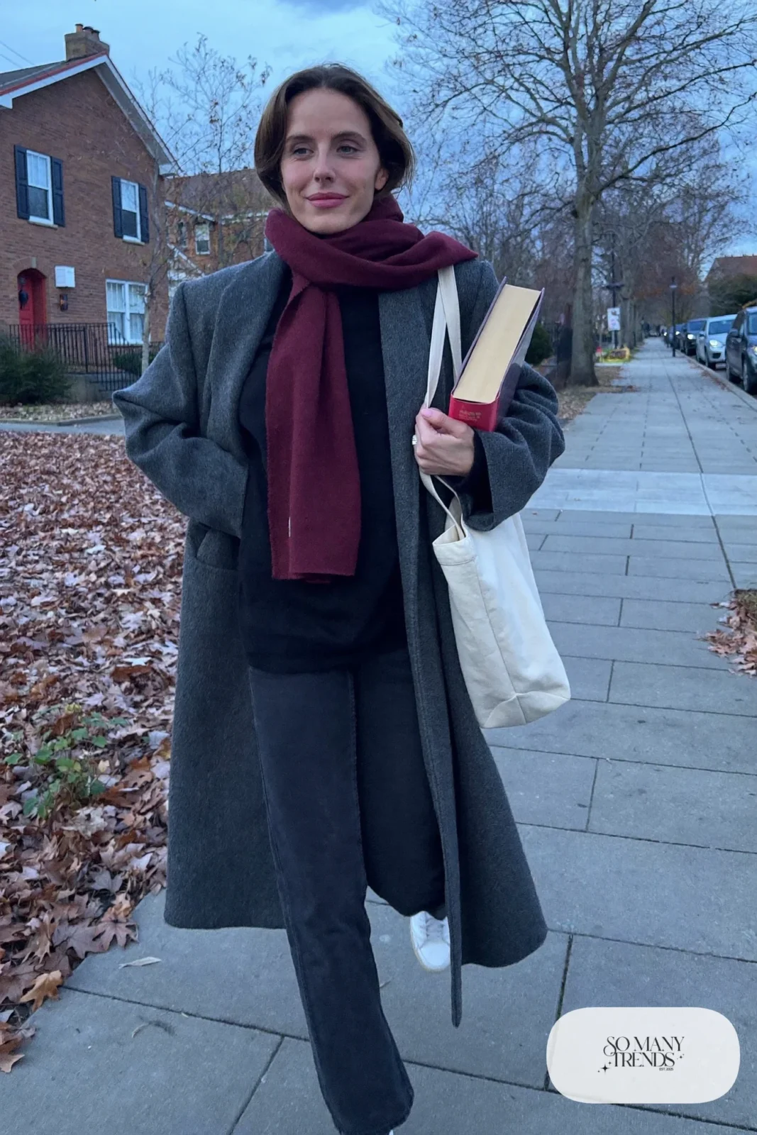 wine wool scarf long gray coat dark straight jeans white sneakers black sweater tote bag outfit 11
