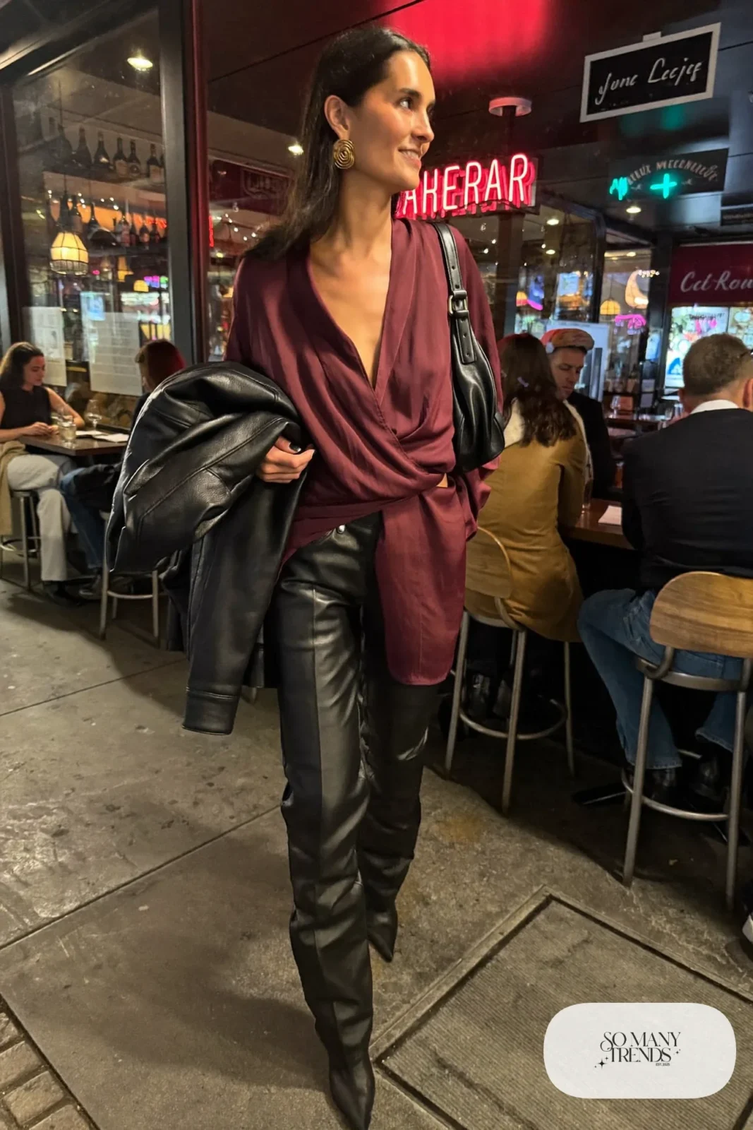 wine wrap blouse black straight faux leather pants pointed ankle boots statement earrings small bag outfit 17