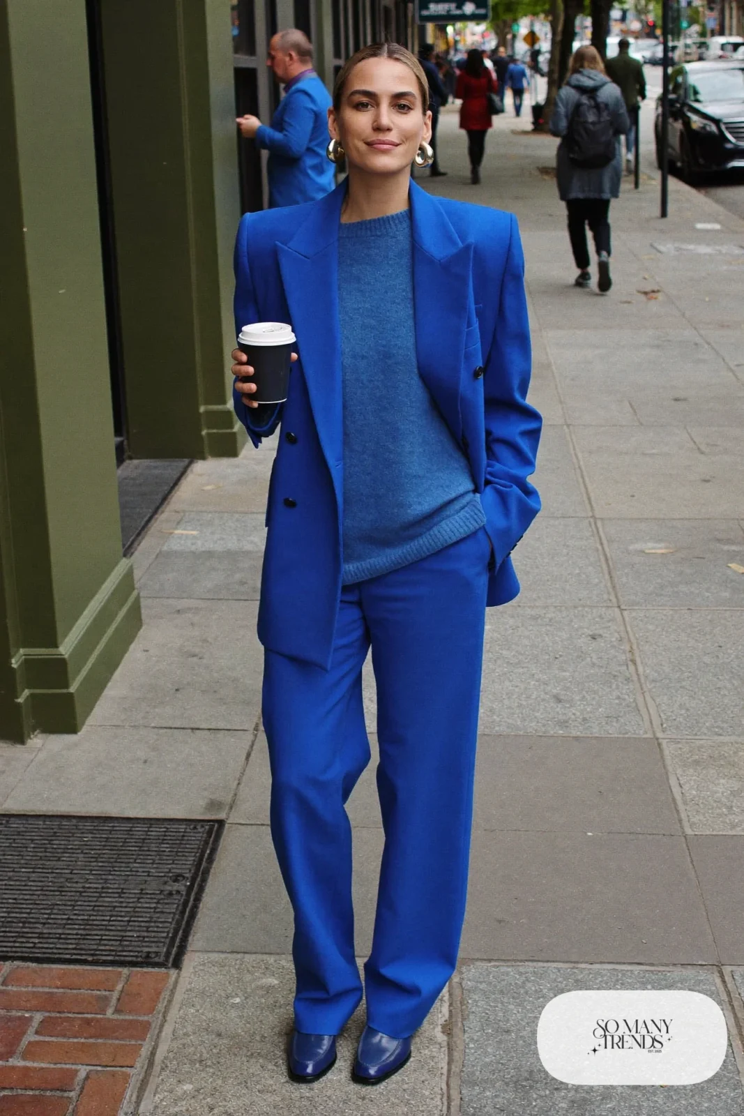 woman in cobalt blue oversized blazer, wide-leg pants, knit top and loafers outfit 1