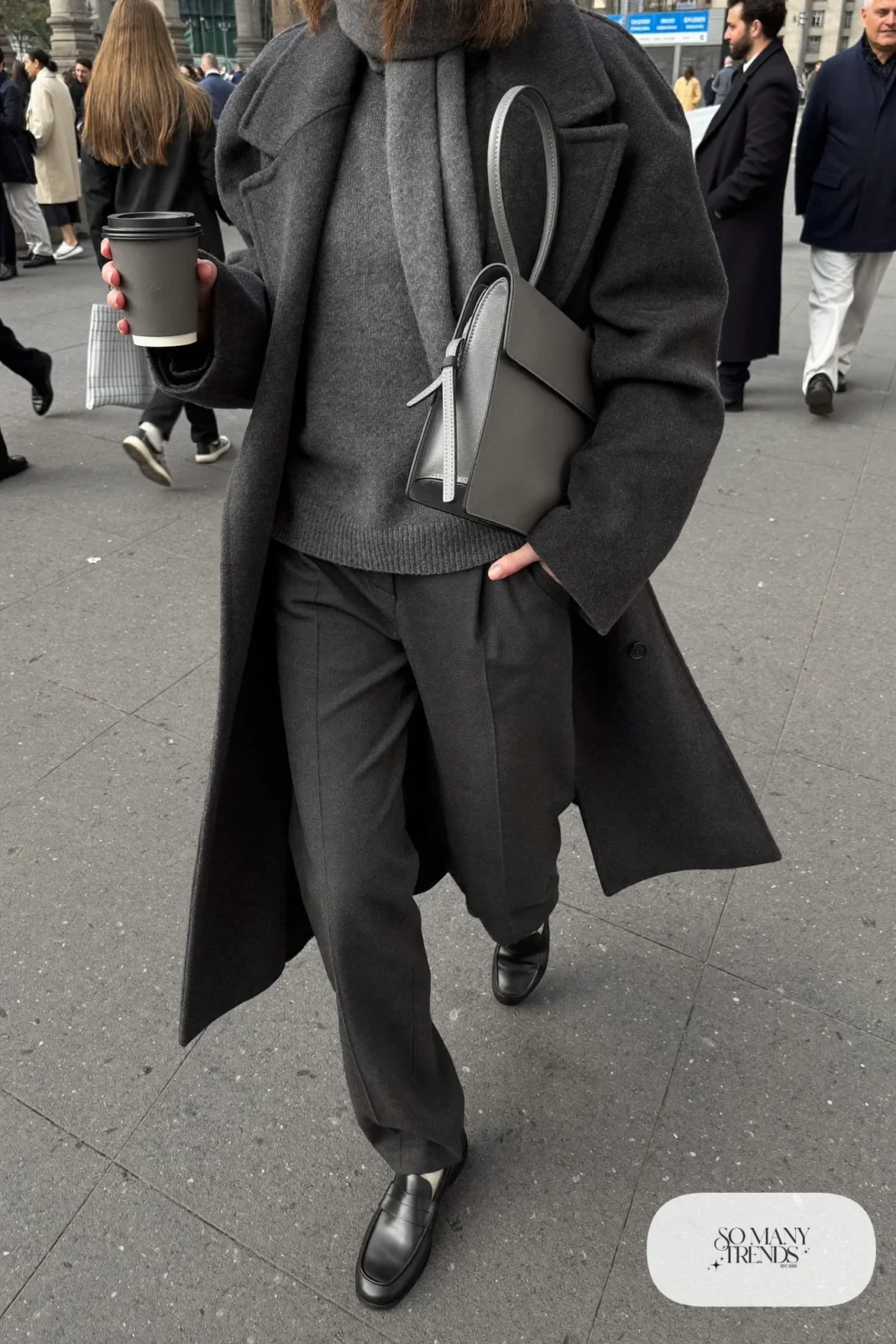 woman in charcoal gray long coat, knit sweater, tailored pants and loafers outfit 6