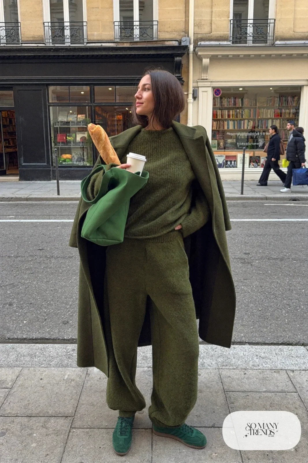 woman in forest green knit sweater, wide-leg knit pants and sneakers outfit 12
