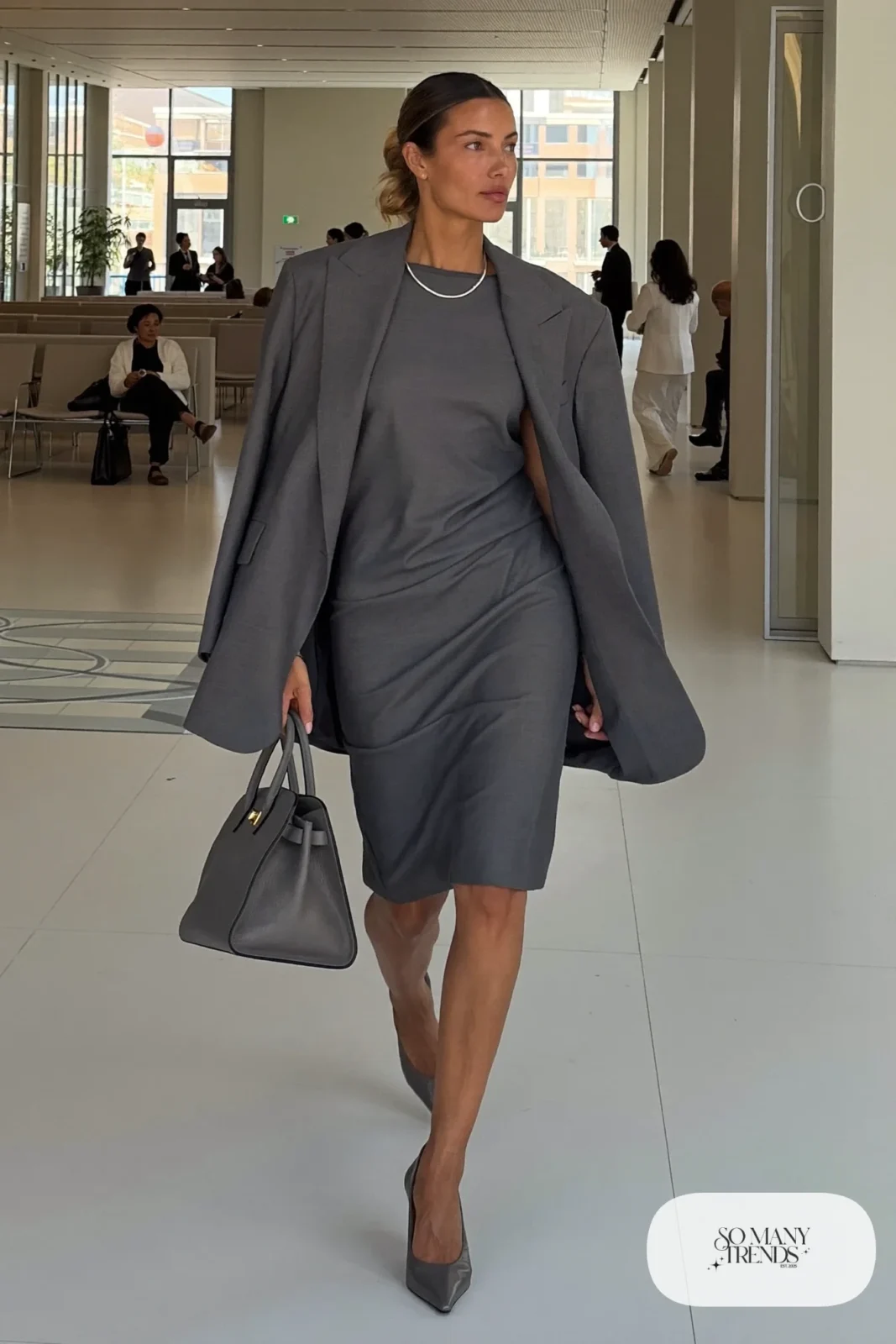 woman in slate gray midi dress, long blazer and pumps outfit 25