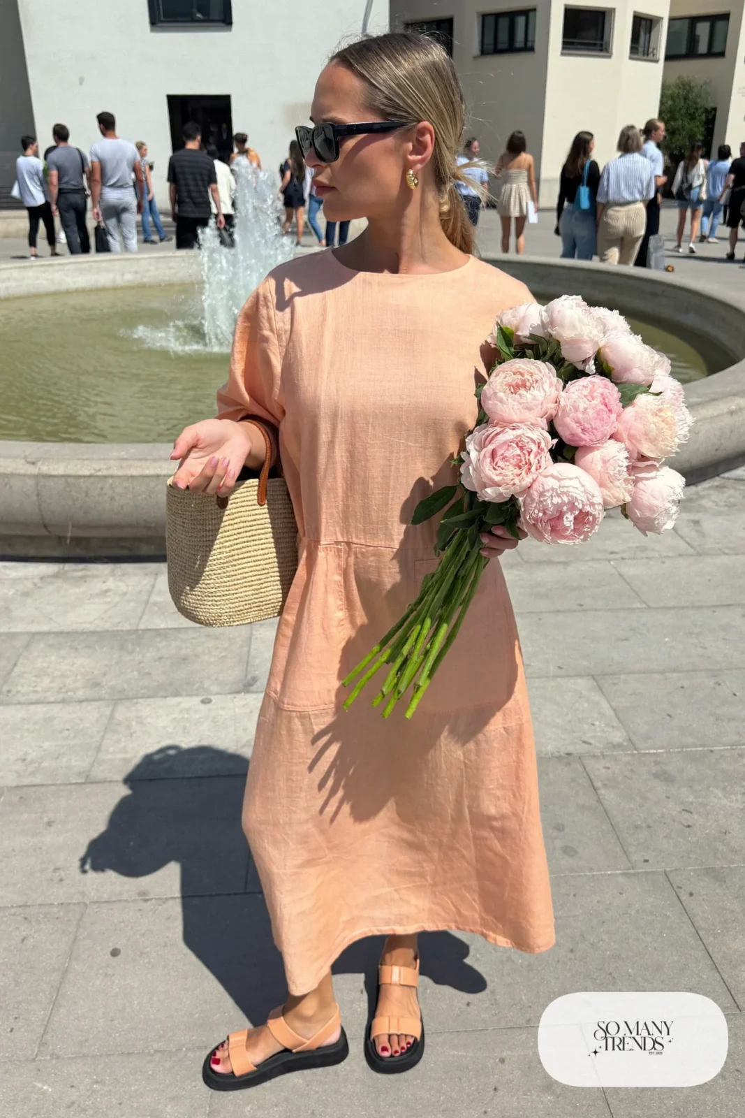woman in peach linen midi dress and leather sandals outfit 26