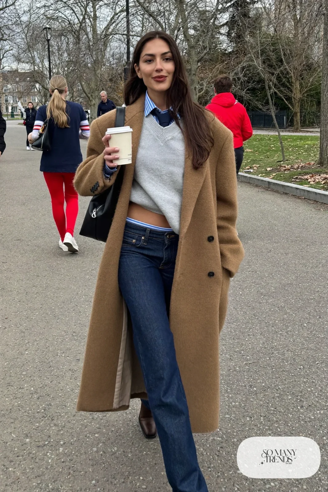 long camel coat, gray sweater, striped shirt with tie, straight jeans, brown boots outfit 21