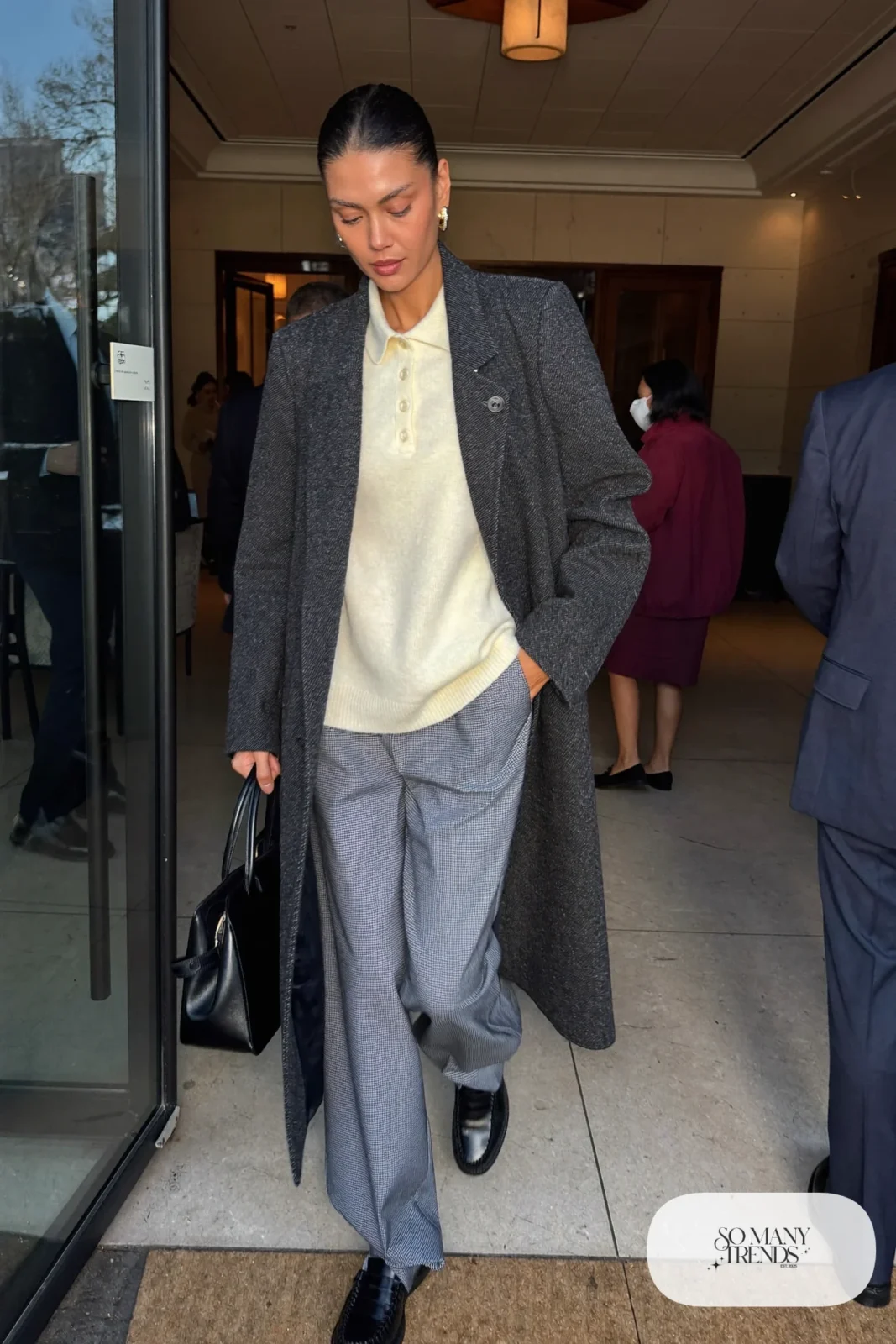 charcoal wool coat, cream polo collar knit, gray plaid pants, black loafers, leather bag outfit 23