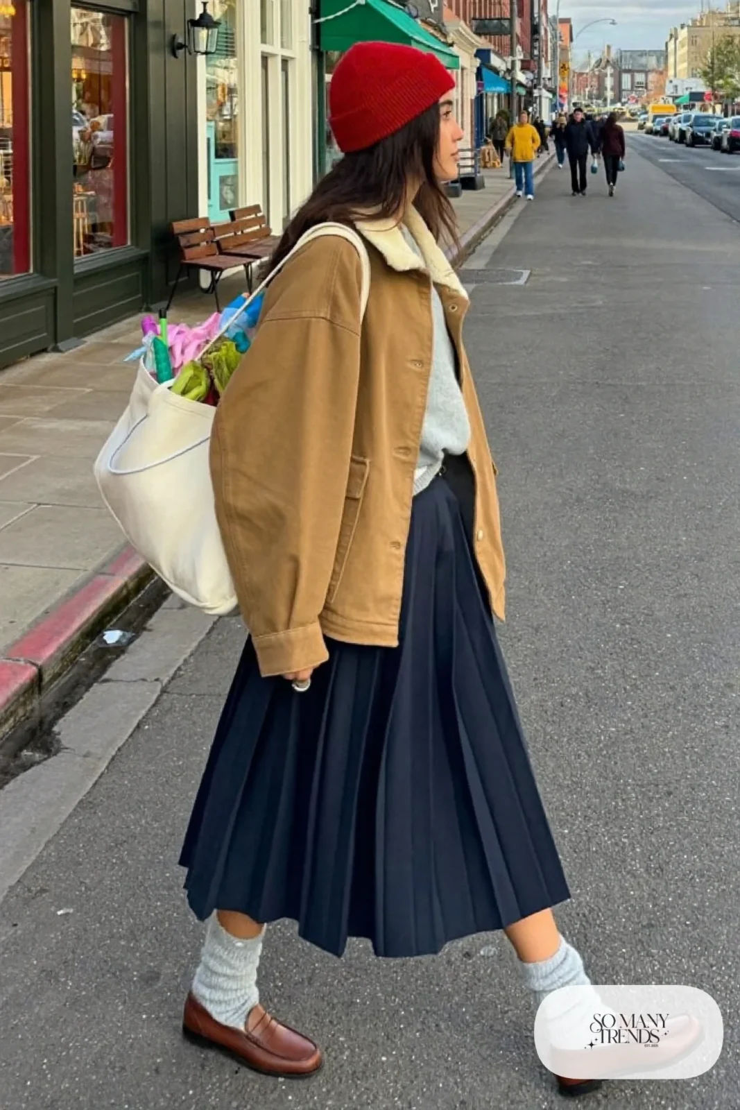 tan sherpa collar chore jacket, navy pleated midi skirt, gray chunky socks, brown loafers, tote outfit 26