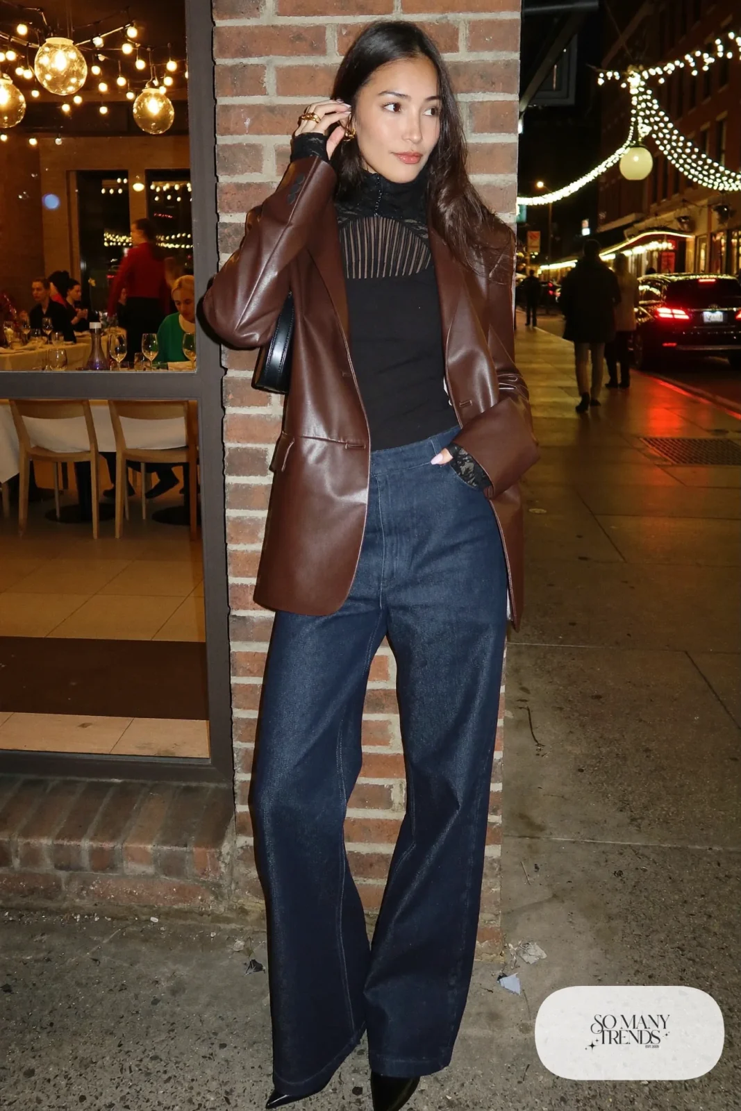 black high neck lace bodysuit chocolate brown leather blazer dark wide leg jeans pointed ankle boots gold ring outfit 4