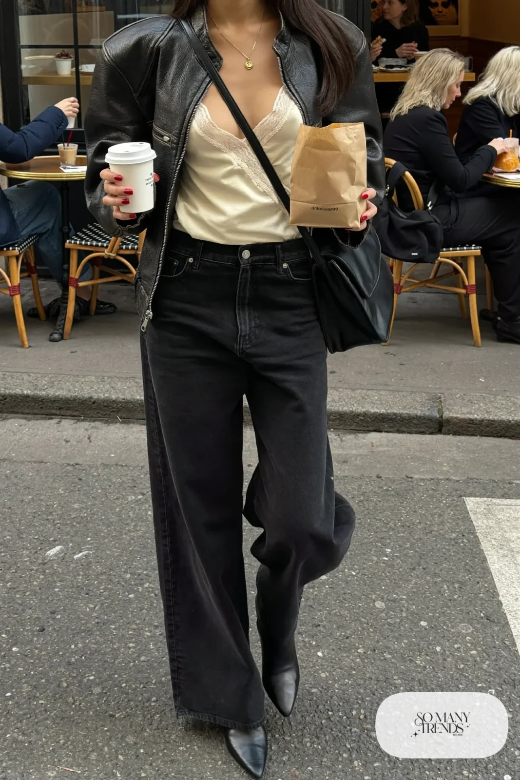 dark wide leg jeans cream lace edged tank oversized black leather jacket pointed black ankle boots crossbody bag outfit 16