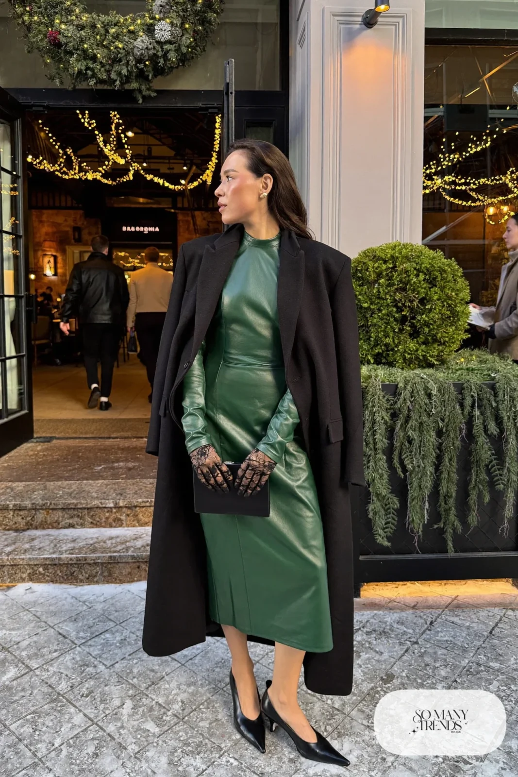 forest green faux leather midi dress black lace gloves black wool coat black pumps gold earrings small clutch outfit 26