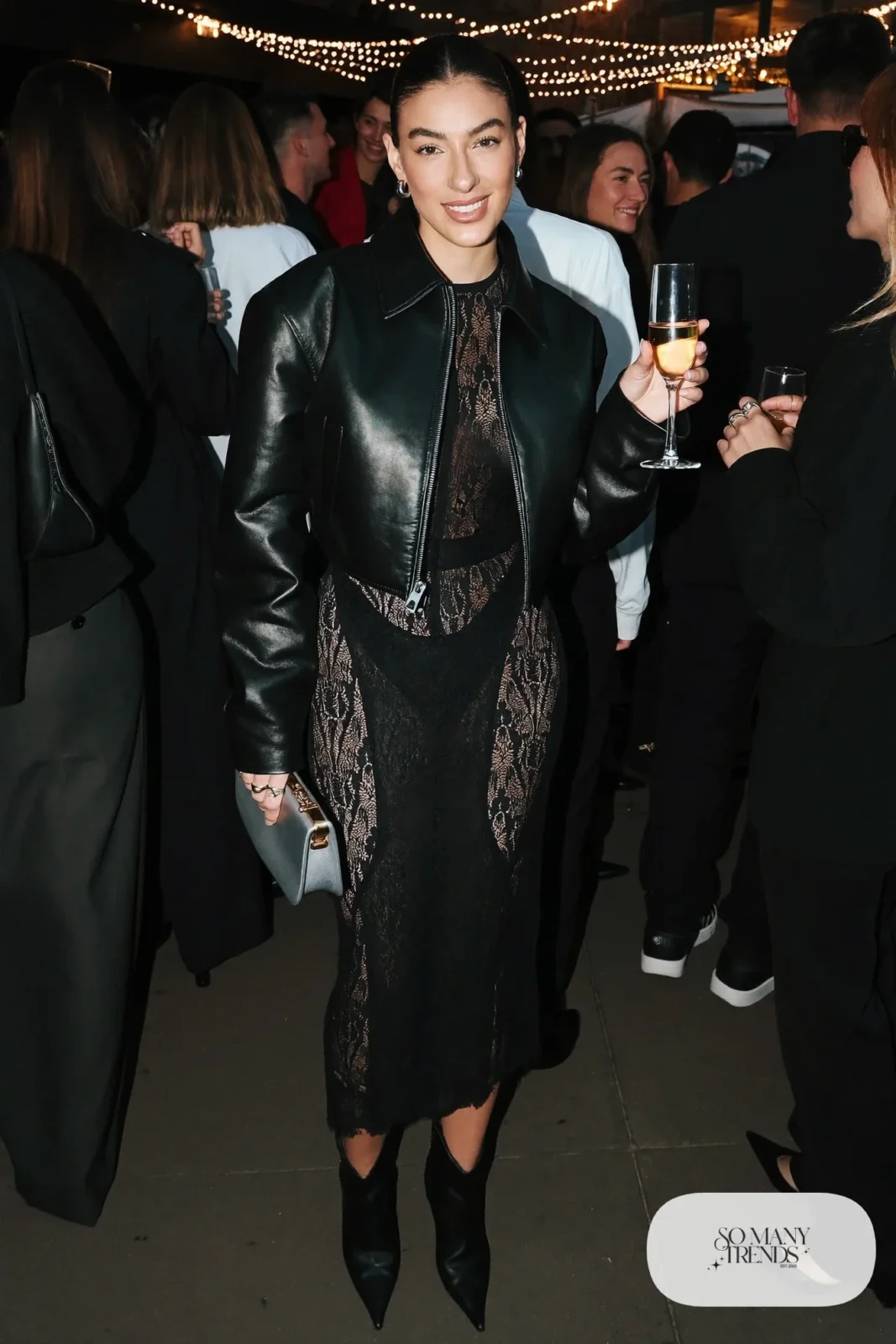 black lace top and midi skirt set cropped black leather jacket pointed black heeled boots small silver clutch outfit 27