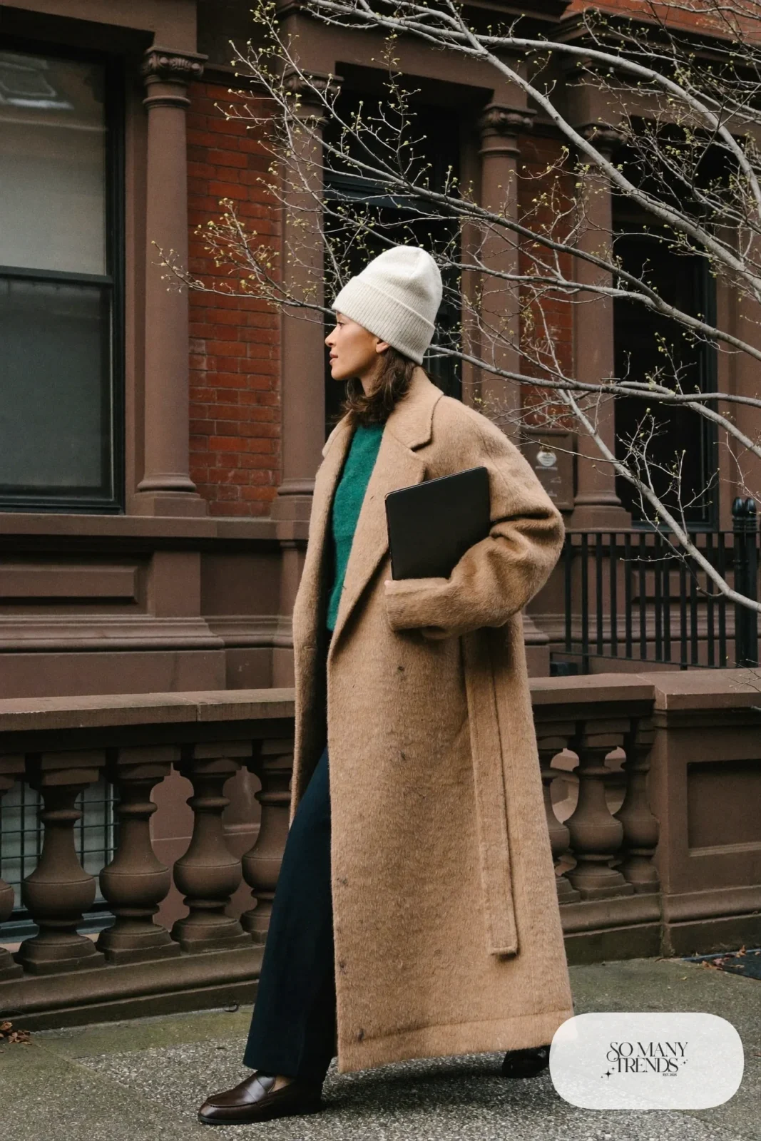 camel long coat forest green merino sweater navy straight pants brown leather loafers leather tote outfit 8