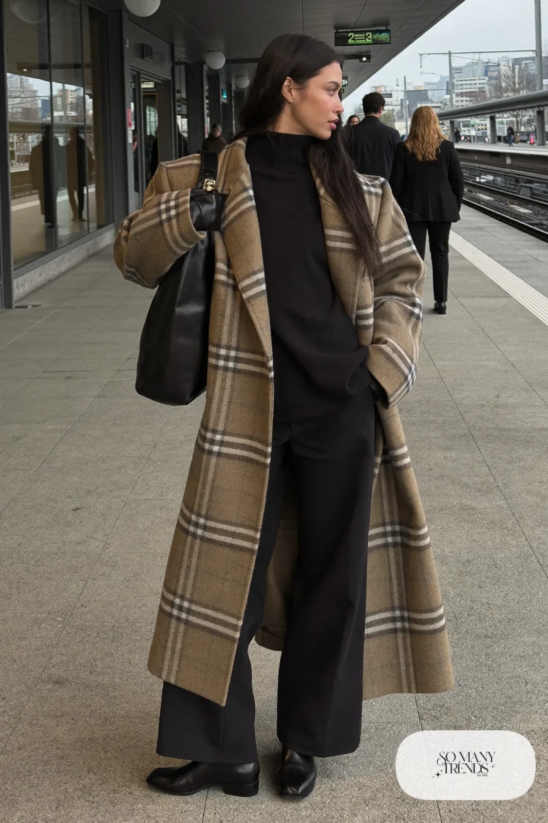 gray and camel plaid long coat black turtleneck black wide-leg pants black chelsea boots leather gloves outfit 11