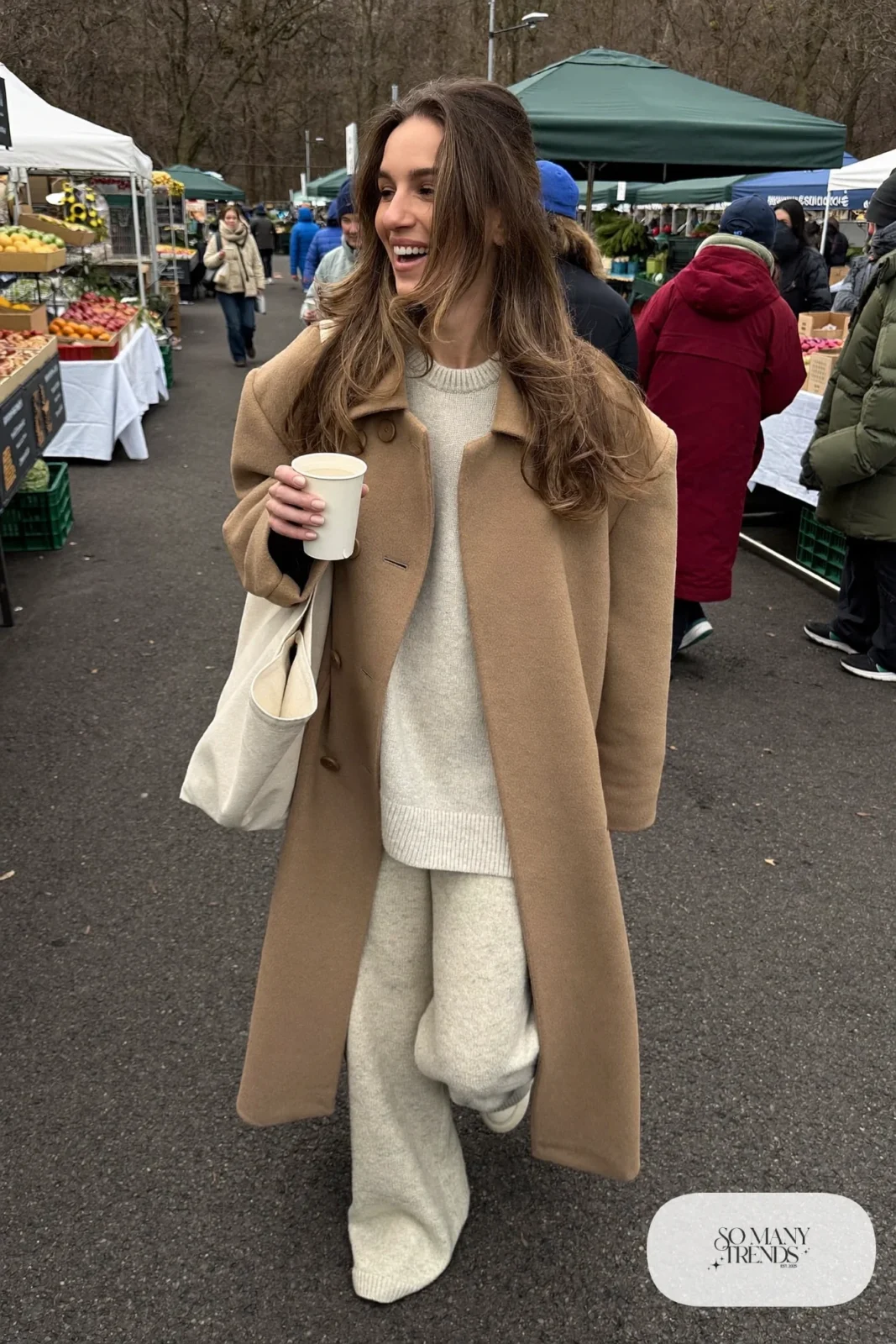 camel long coat oatmeal knit sweater matching knit wide-leg pants white slip-on sneakers canvas tote outfit 25