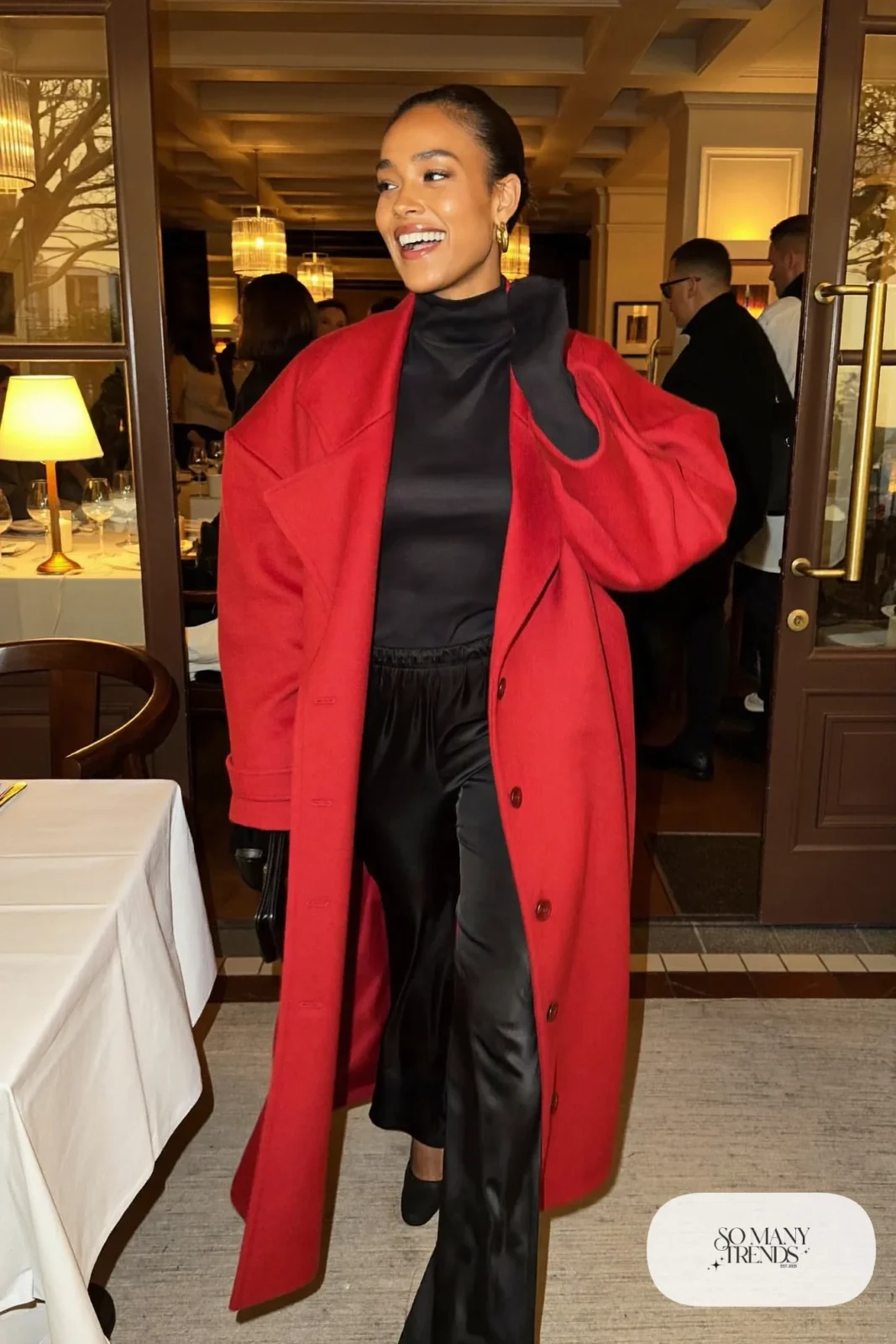cherry red long coat black bodysuit black satin wide-leg pants black closed-toe pumps gold earrings clutch outfit 26