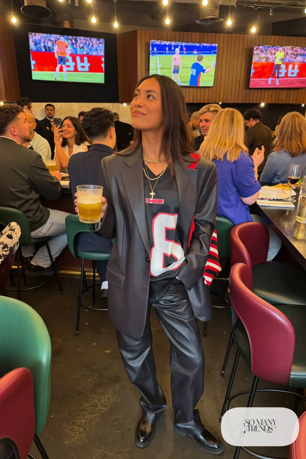 black football jersey faux leather straight pants charcoal oversized blazer loafers gold chains outfit 7
