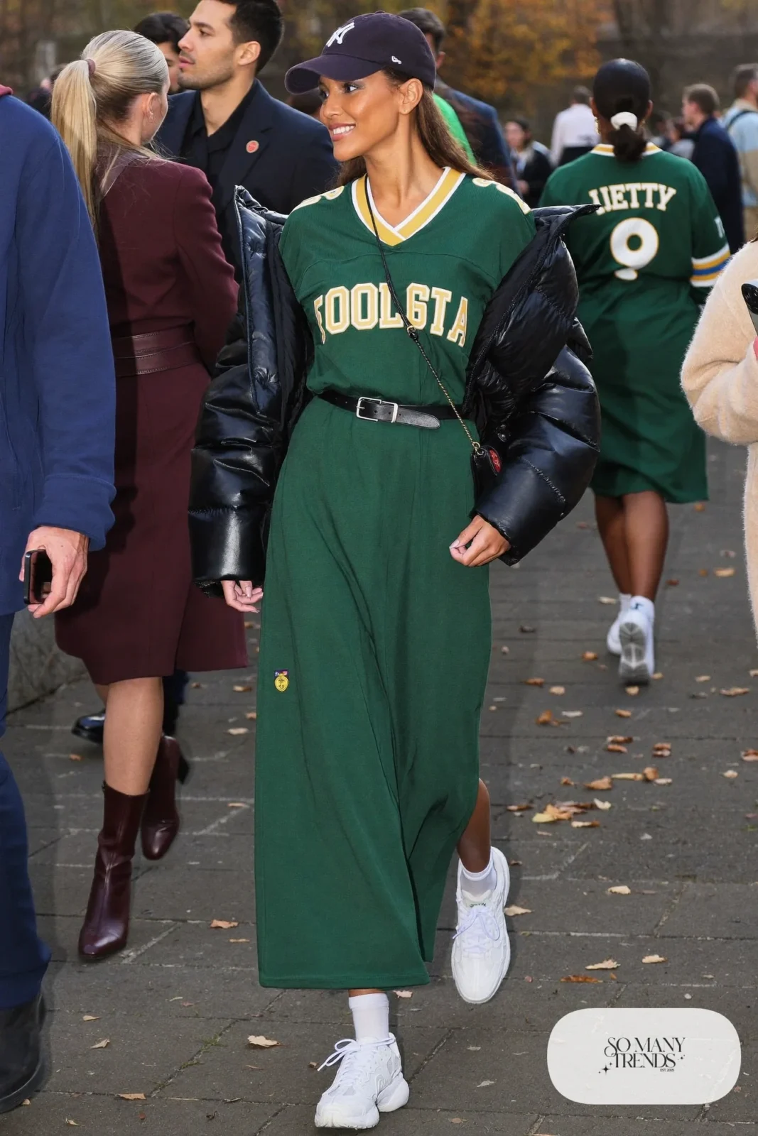 green football jersey dress belted cropped puffer jacket chunky white sneakers baseball cap outfit 13
