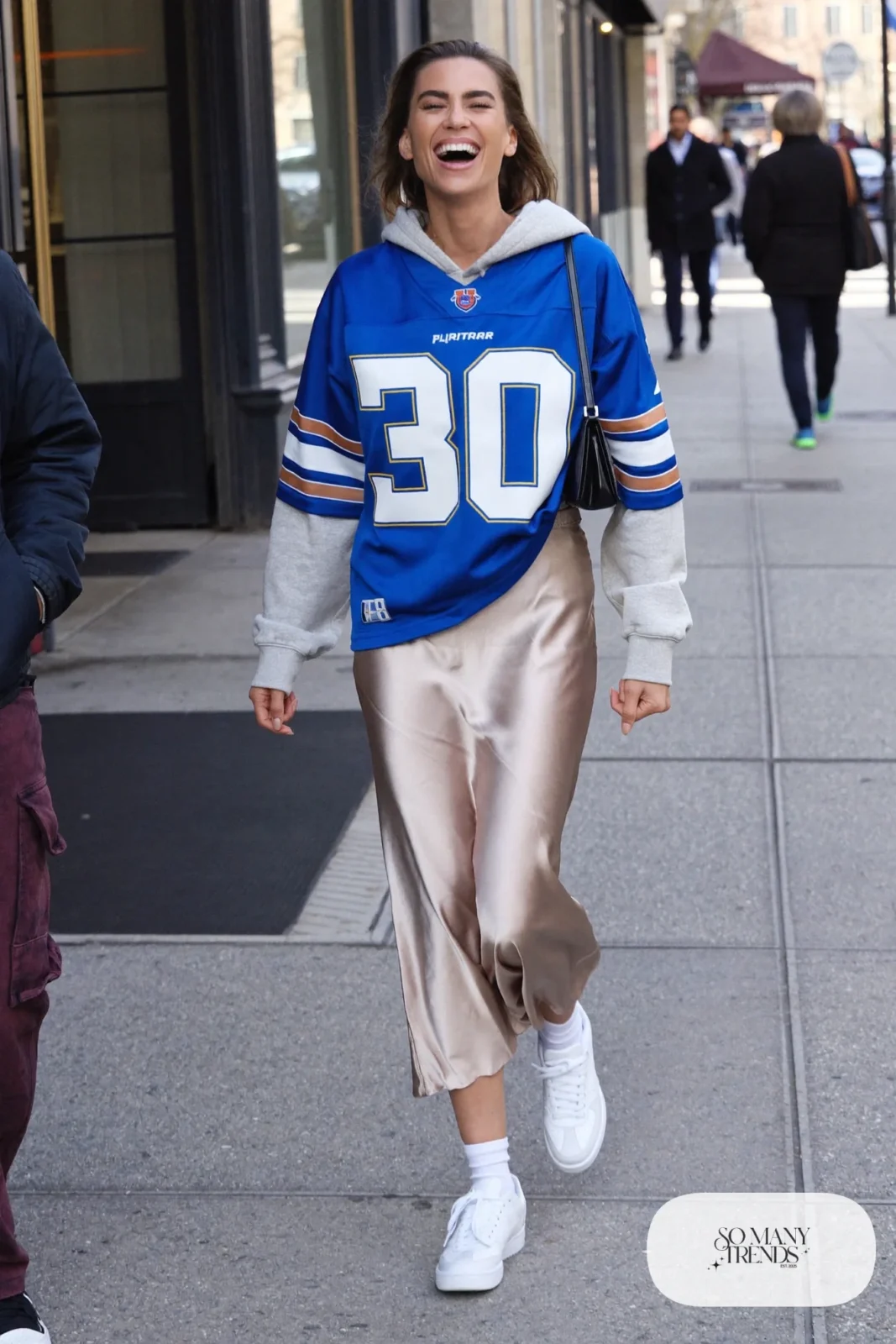cobalt football jersey champagne satin slip midi skirt gray hoodie white sneakers small bag outfit 16