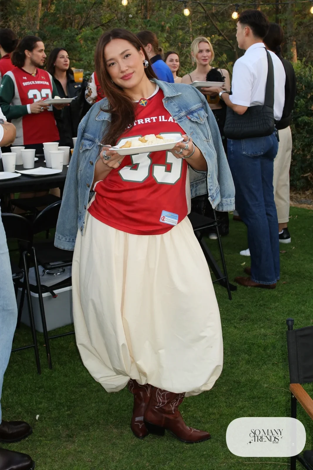 red football jersey cream maxi skirt denim jacket cowboy boots silver rings outfit 17