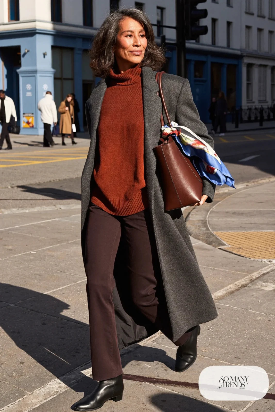 rust turtleneck sweater black straight pants long gray wool coat black ankle boots silk scarf on bag office outfit 6