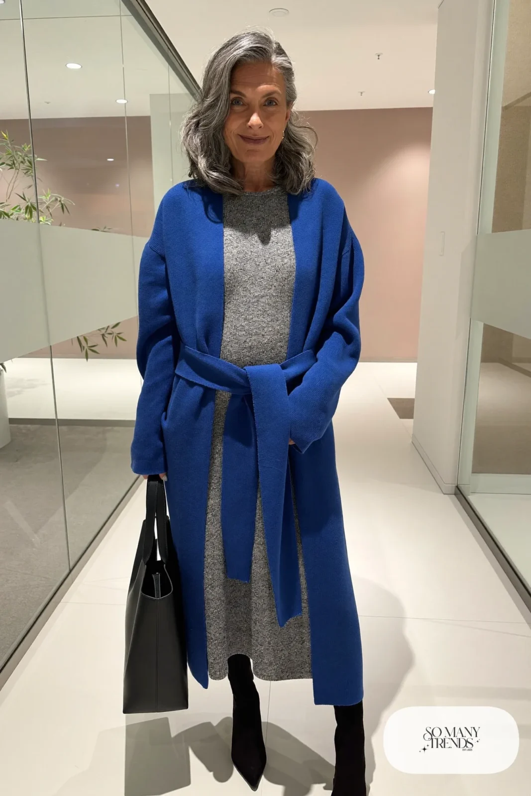 gray knit midi dress cobalt blue long cardigan black opaque tights black boots slim belt office outfit 8