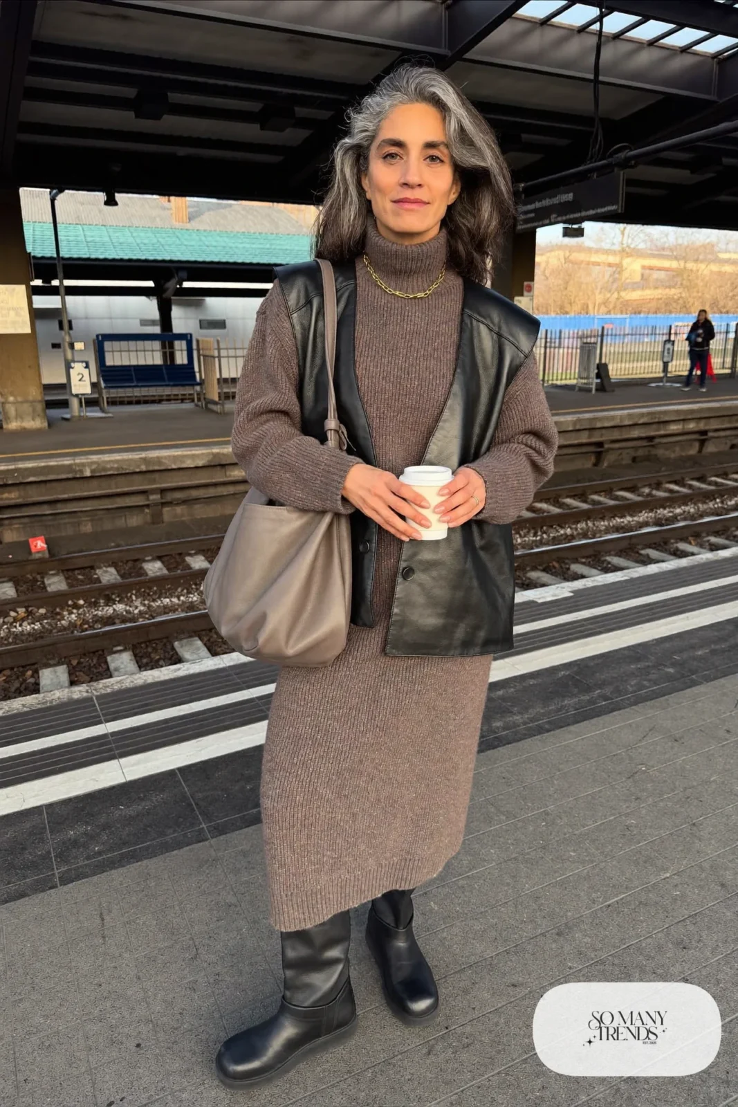 gray ribbed turtleneck sweater dress long black vest tall black boots leather crossbody bag gold necklace office outfit 11