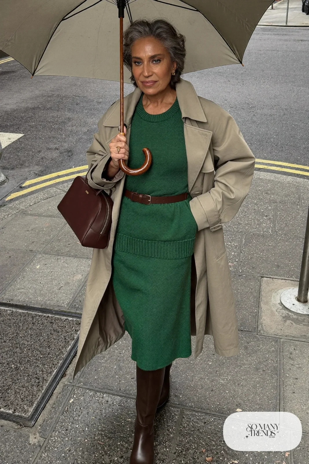 forest green knit midi dress stone trench coat brown belt over coat brown tall boots leather handbag office outfit 15