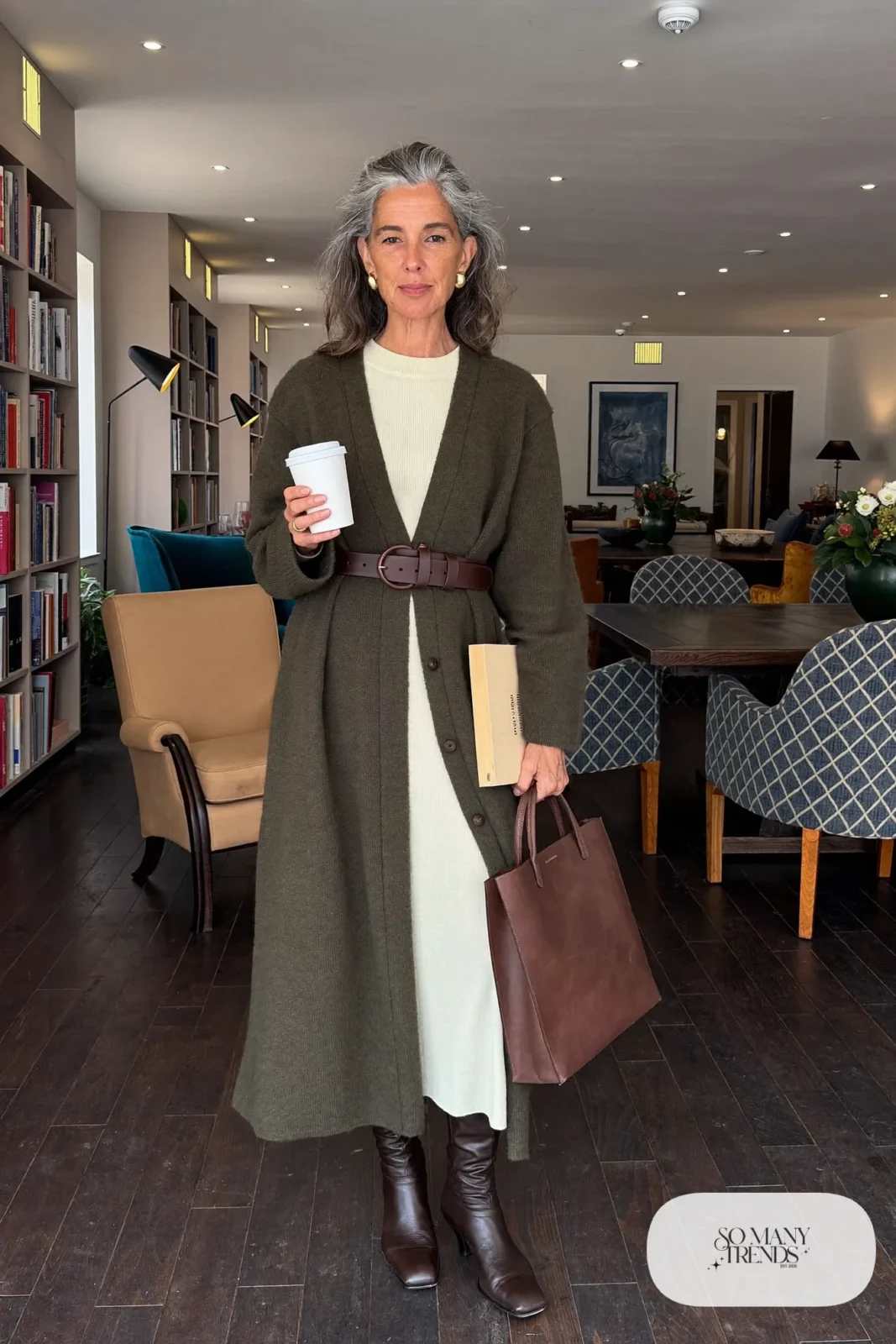 olive long cardigan cream knit midi dress brown knee-high boots brown leather belt leather tote gold earrings office outfit 32