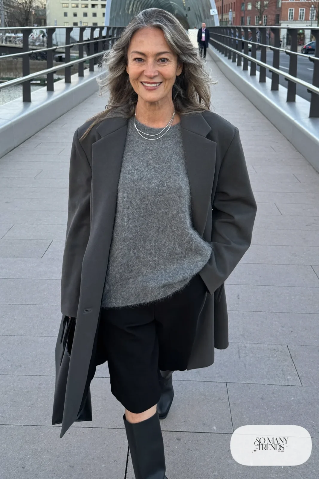 black wide culottes gray oversized sweater long charcoal coat tall black boots leather tote silver necklace office outfit 33
